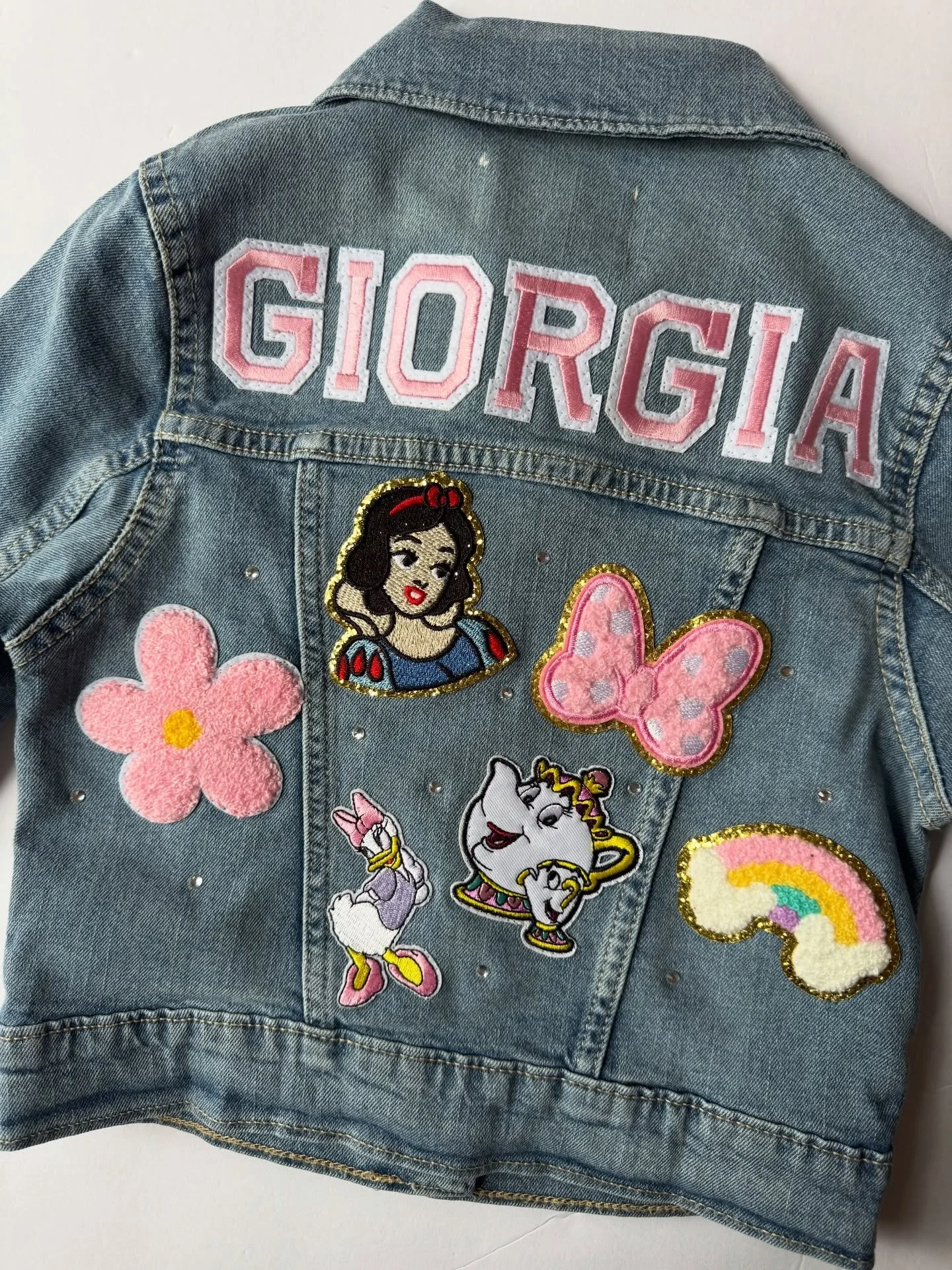 🌸 A bold flower moment to make this Disney piece even more magical. #disney #disneystyle #disneyfashion #disneyjacket #customdisney