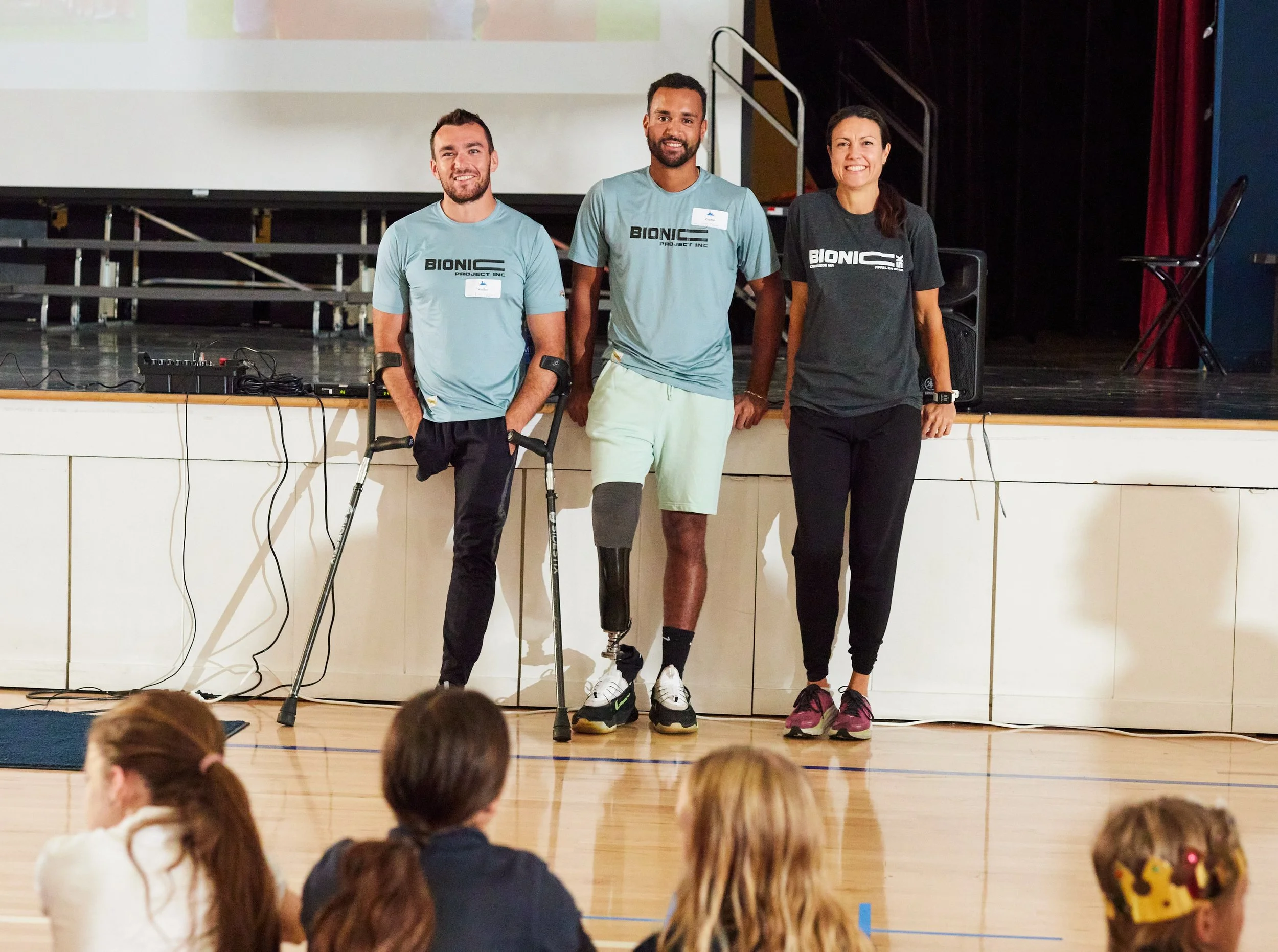 a group of people standing on a stage