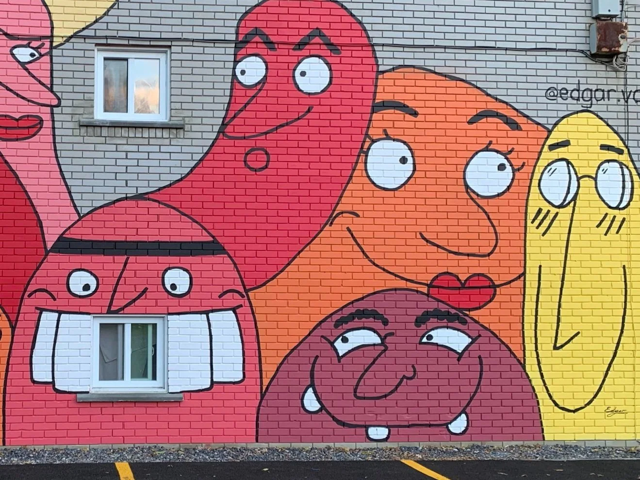 murale et fresque artistique exterieur a longueuil artiste muraliste. la joie rouge artiste muraliste edgar