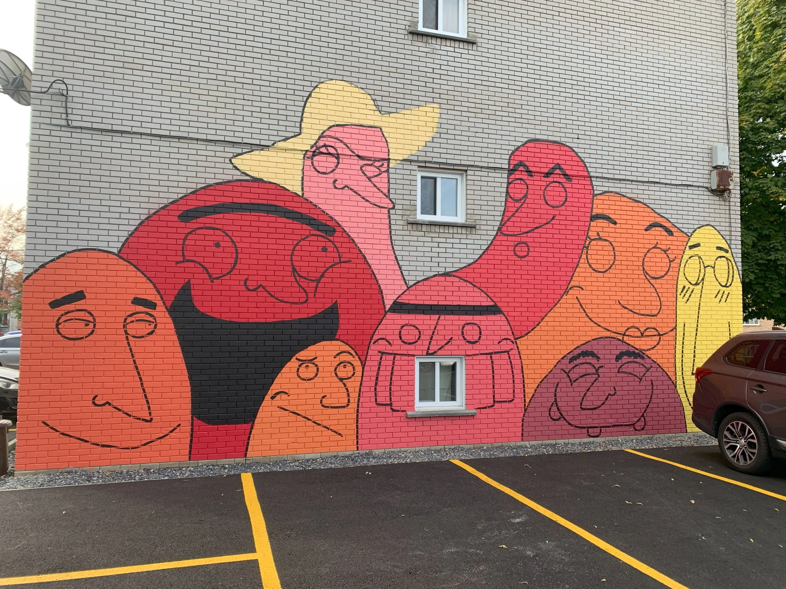 murale et fresque artistique exterieur a longueuil artiste muraliste. la joie rouge artiste muraliste edgar