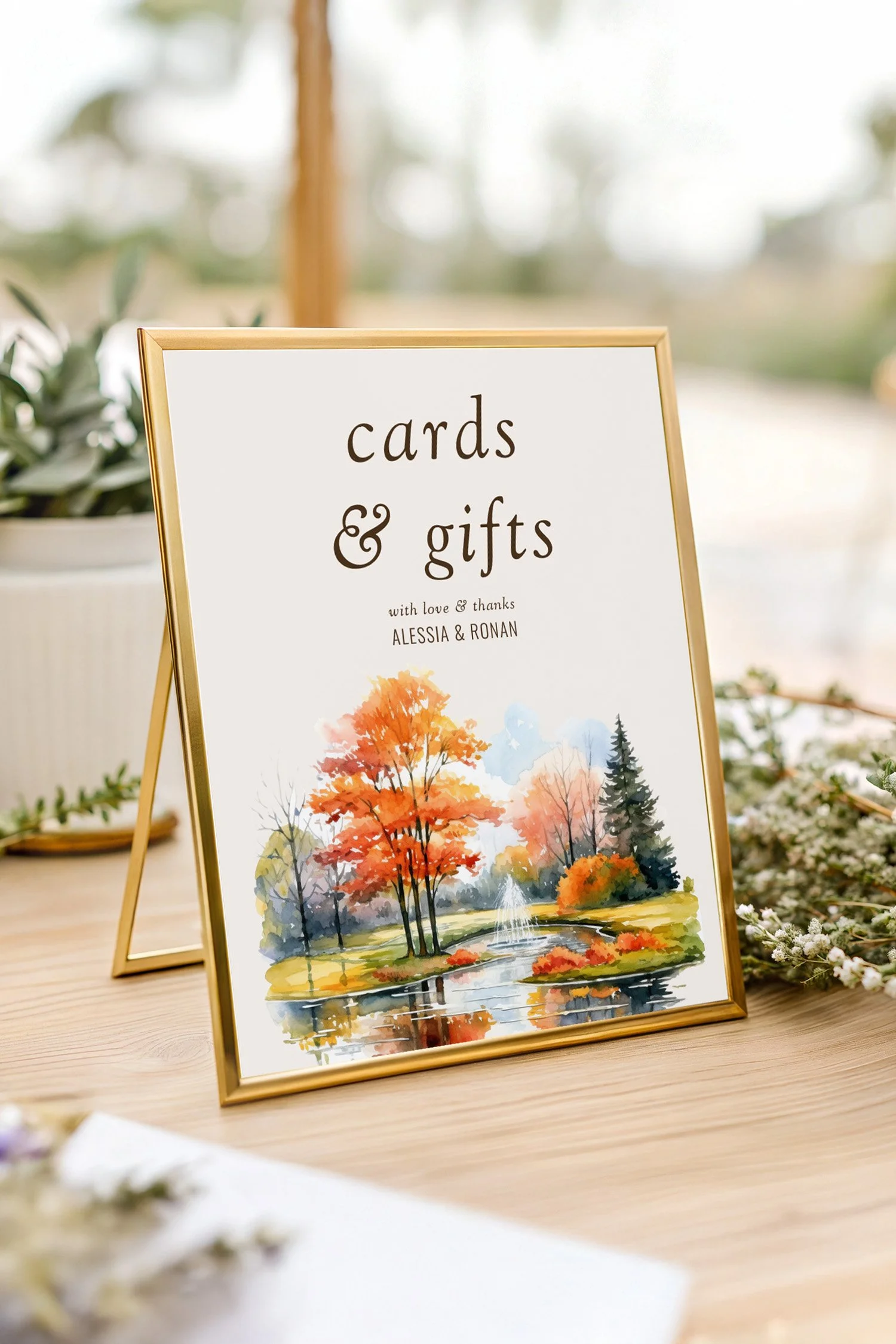 Cards and gifts wedding table sign with illustrated with lakeside woodland in fall