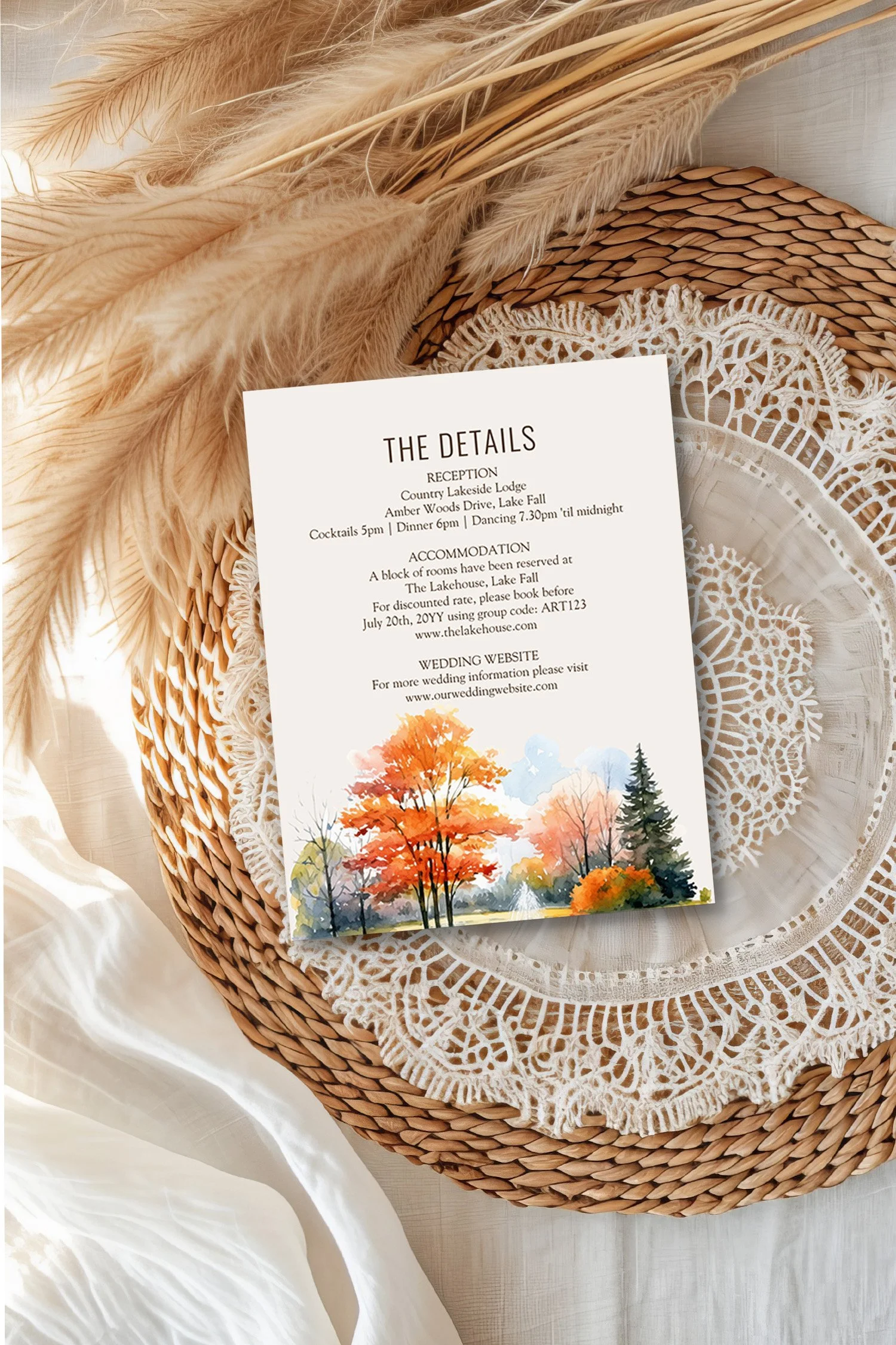 wedding details card illustrated with outdoor woodsy landscape of trees with fall foliage