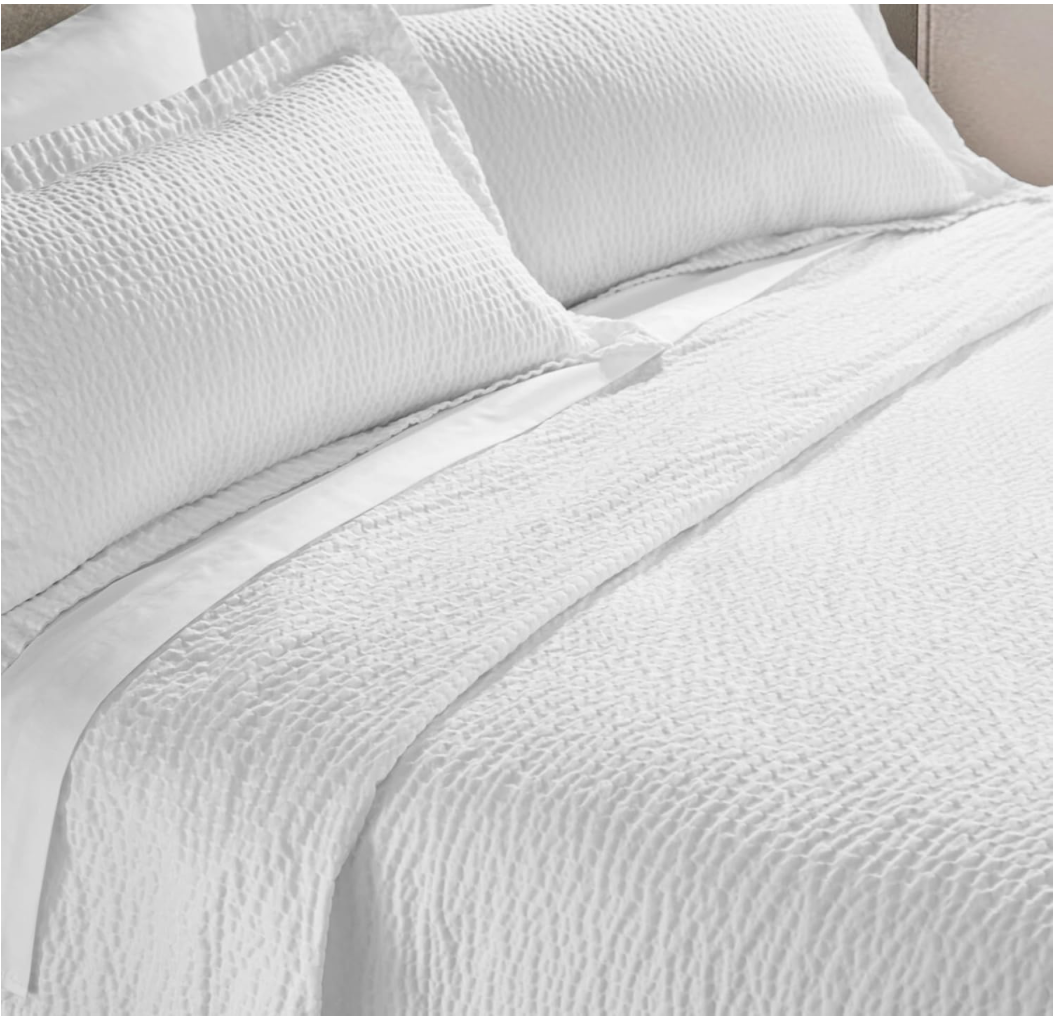 Courtyard by Marriott Coverlet which acts as  great book-light diffusion.