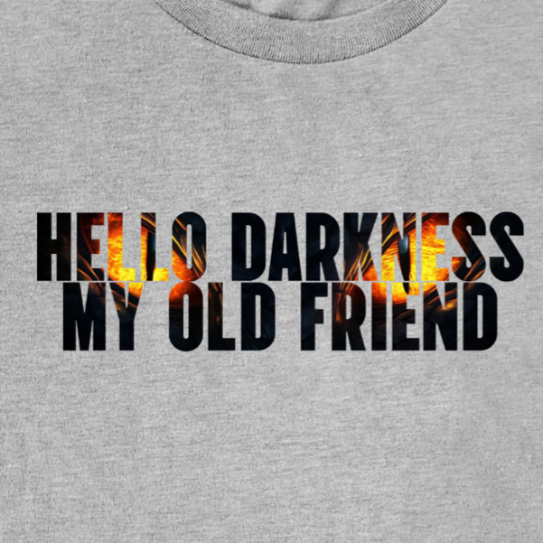 Folded heathered black fantasy dragon shirt featuring glowing dragon eyes design inspired by dark fantasy