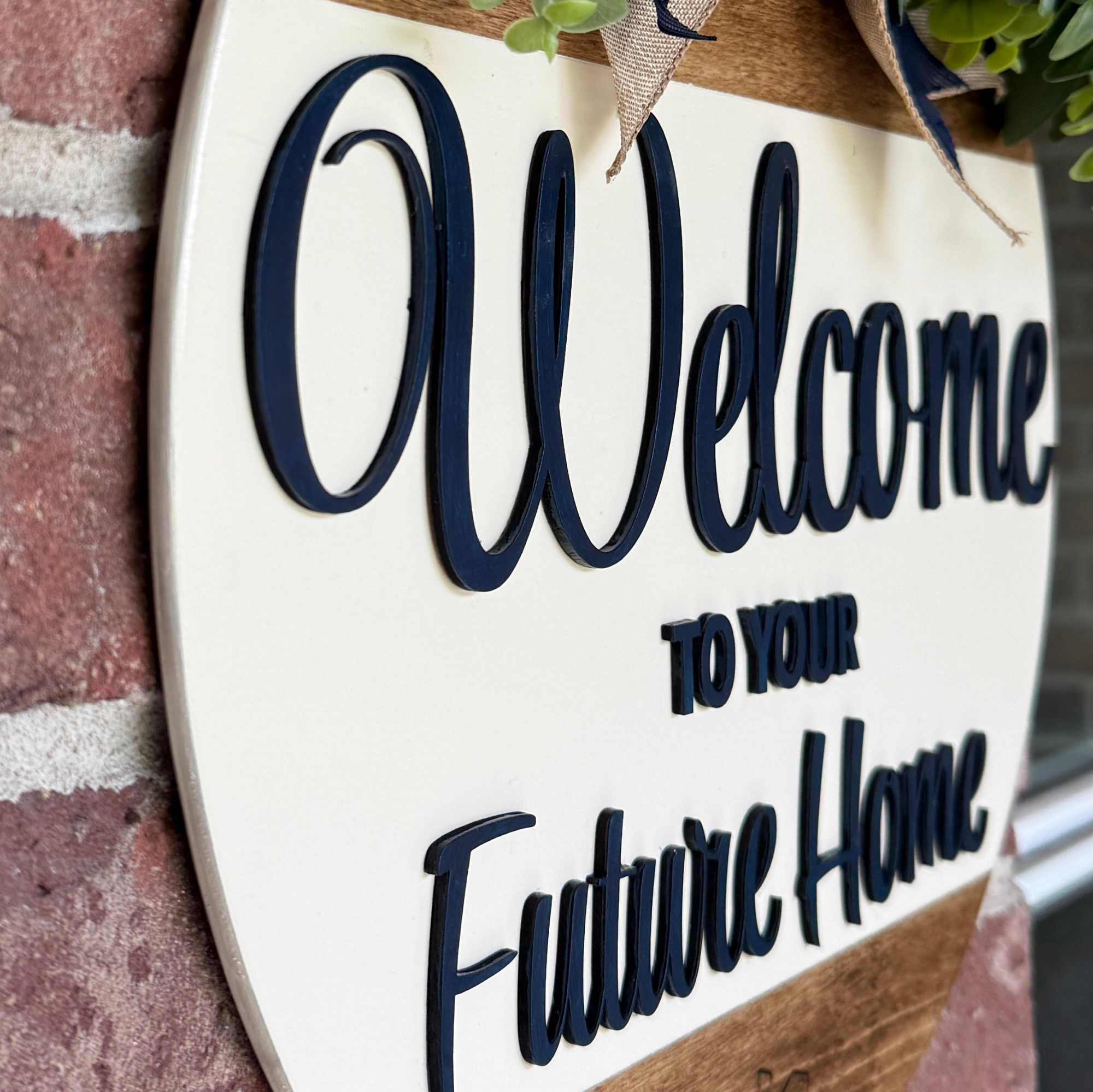 Side view of a personalized open house sign showing dimensional wood lettering.
