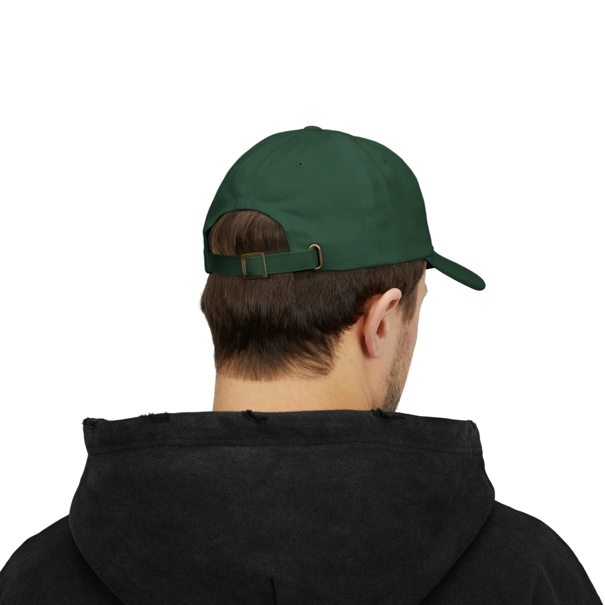 Back view of spruce green dad cap worn by model showing adjustable strap and curved brim.