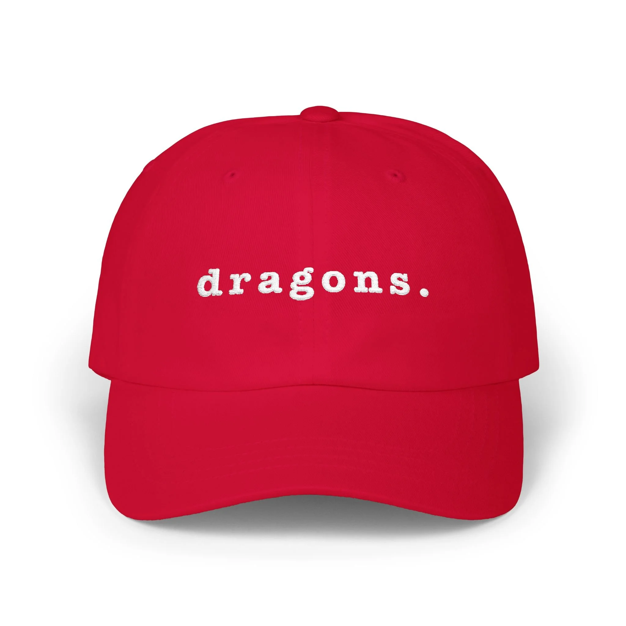Cranberry red dad cap on white background displaying embroidered “dragons.” text on the front.