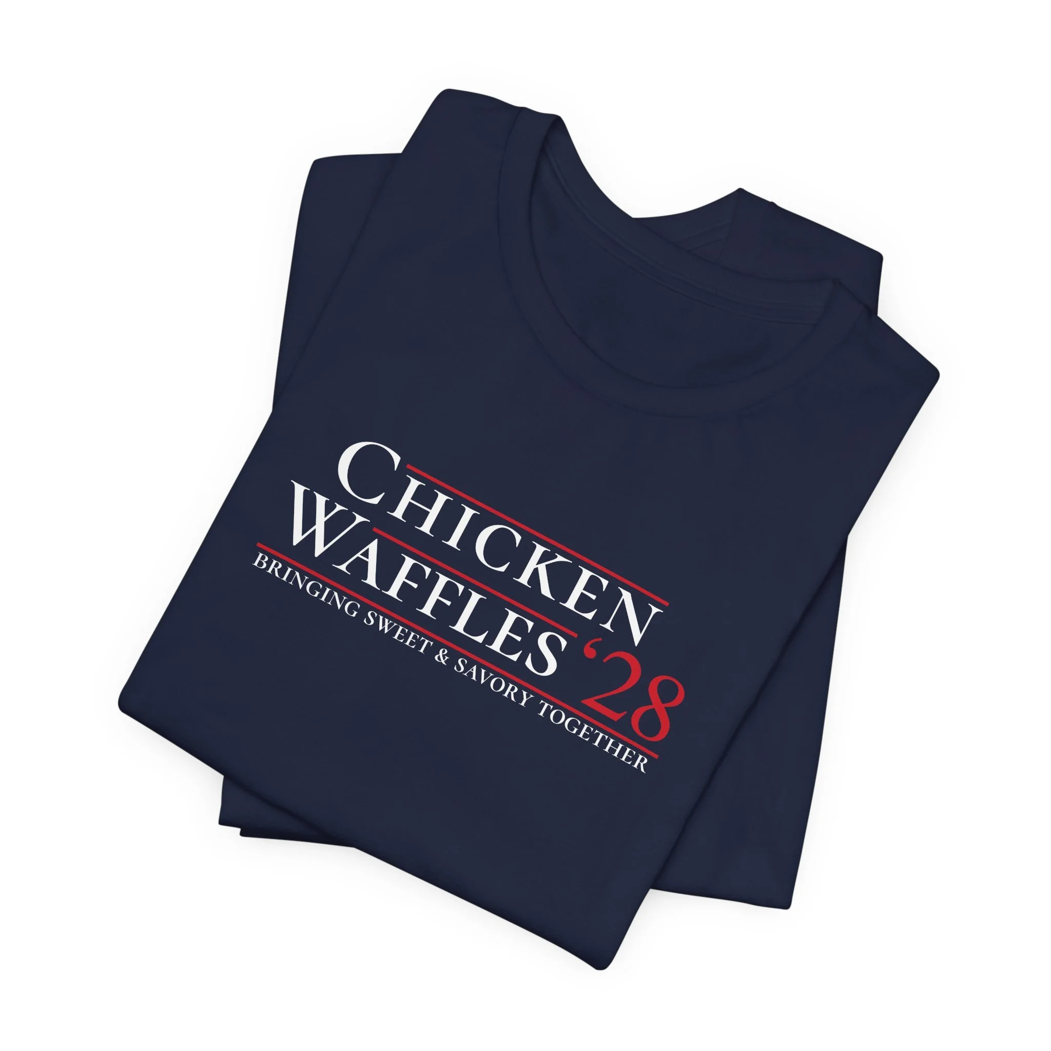 Stacked navy tees featuring Chicken Waffles ’28 campaign parody design