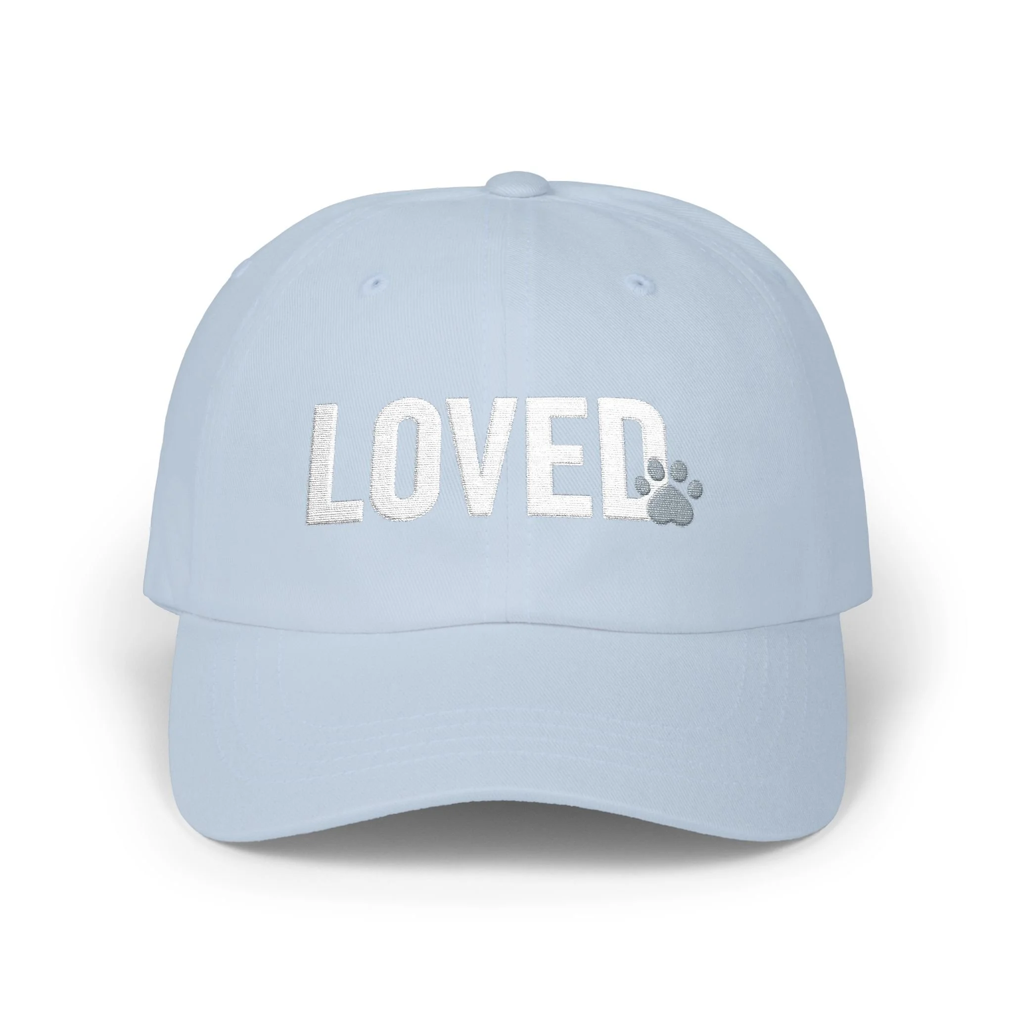Front view of light blue dad cap with white embroidered LOVED text