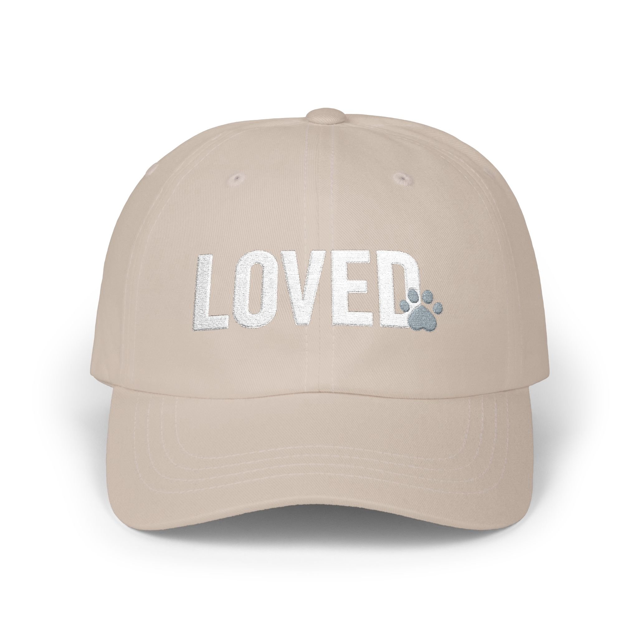 Front view of stone colored dad cap with white embroidered LOVED text