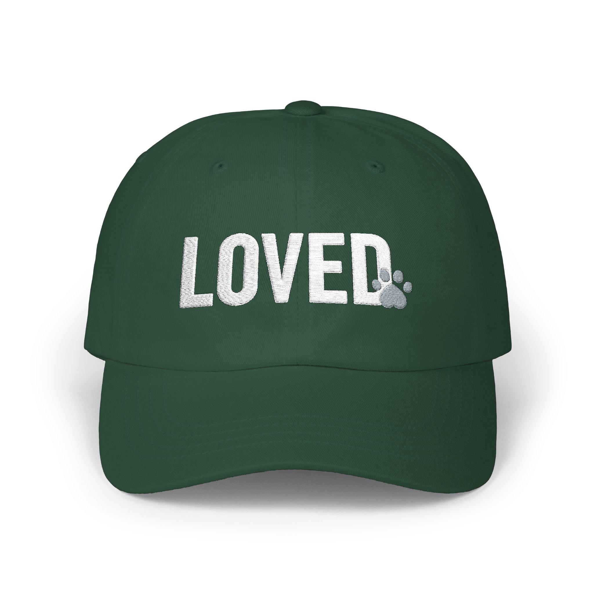 Front view of spruce colored dad cap with white embroidered LOVED text