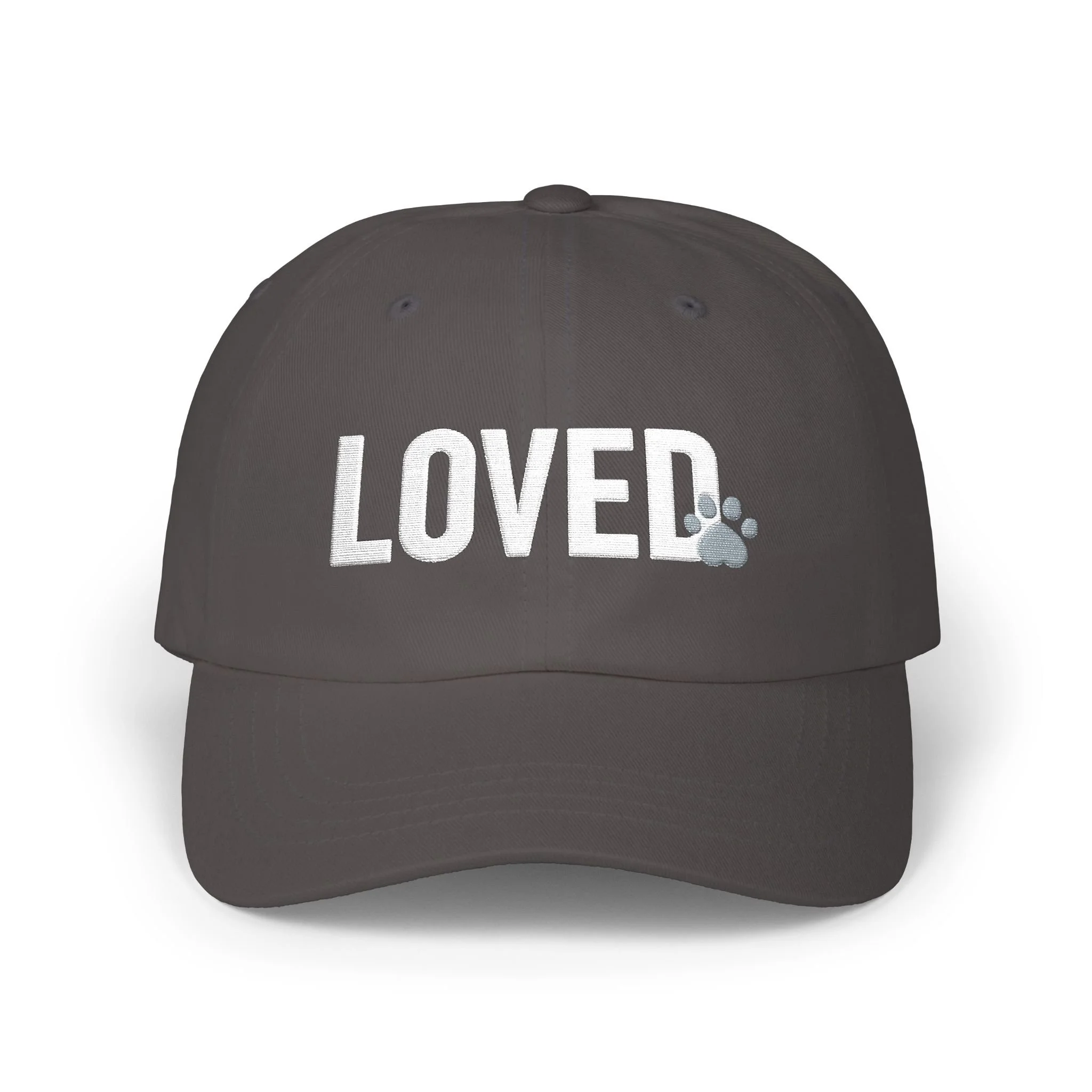 Front view of dark gray dad cap with white embroidered LOVED text