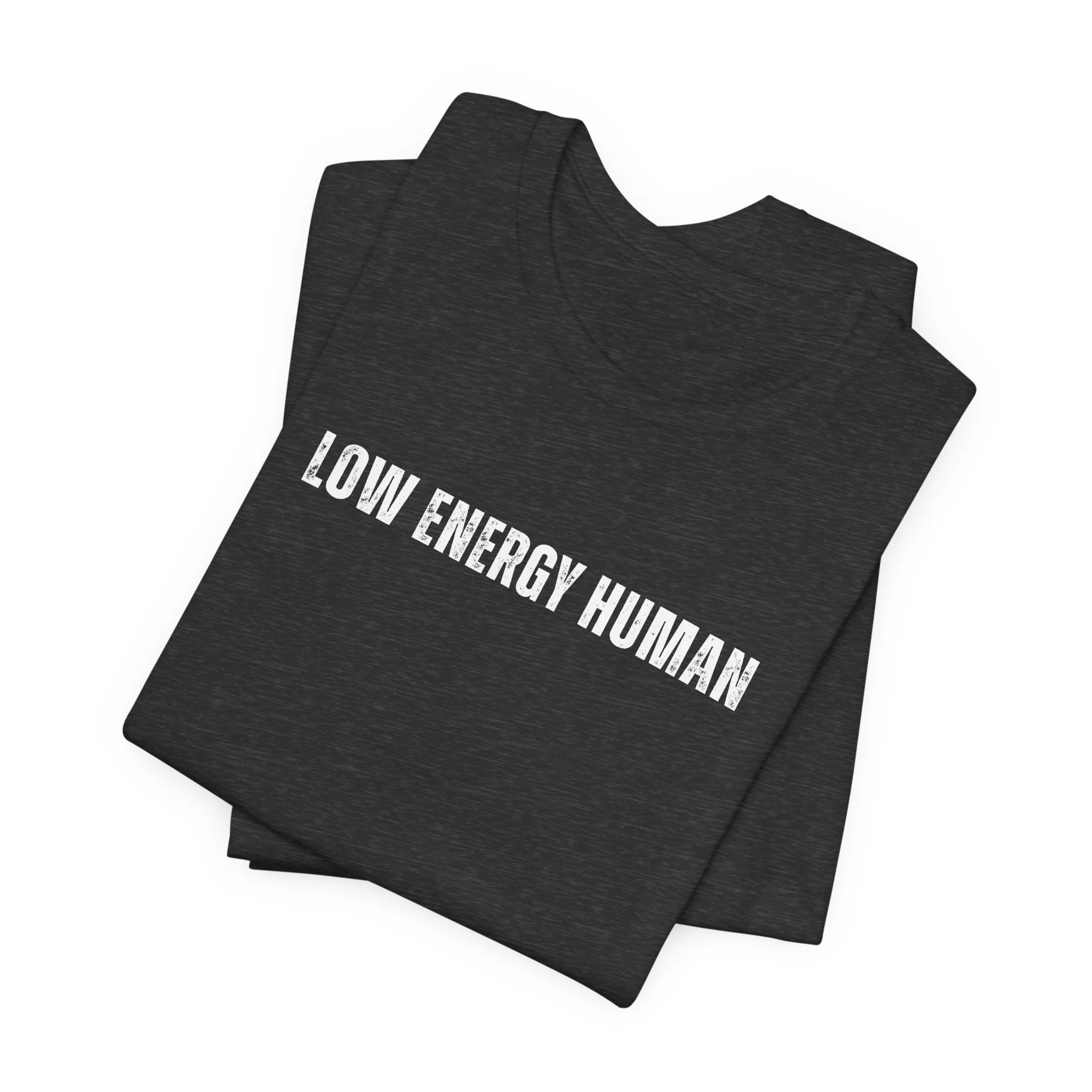 Folded dark heather gray t shirt with low energy human white text