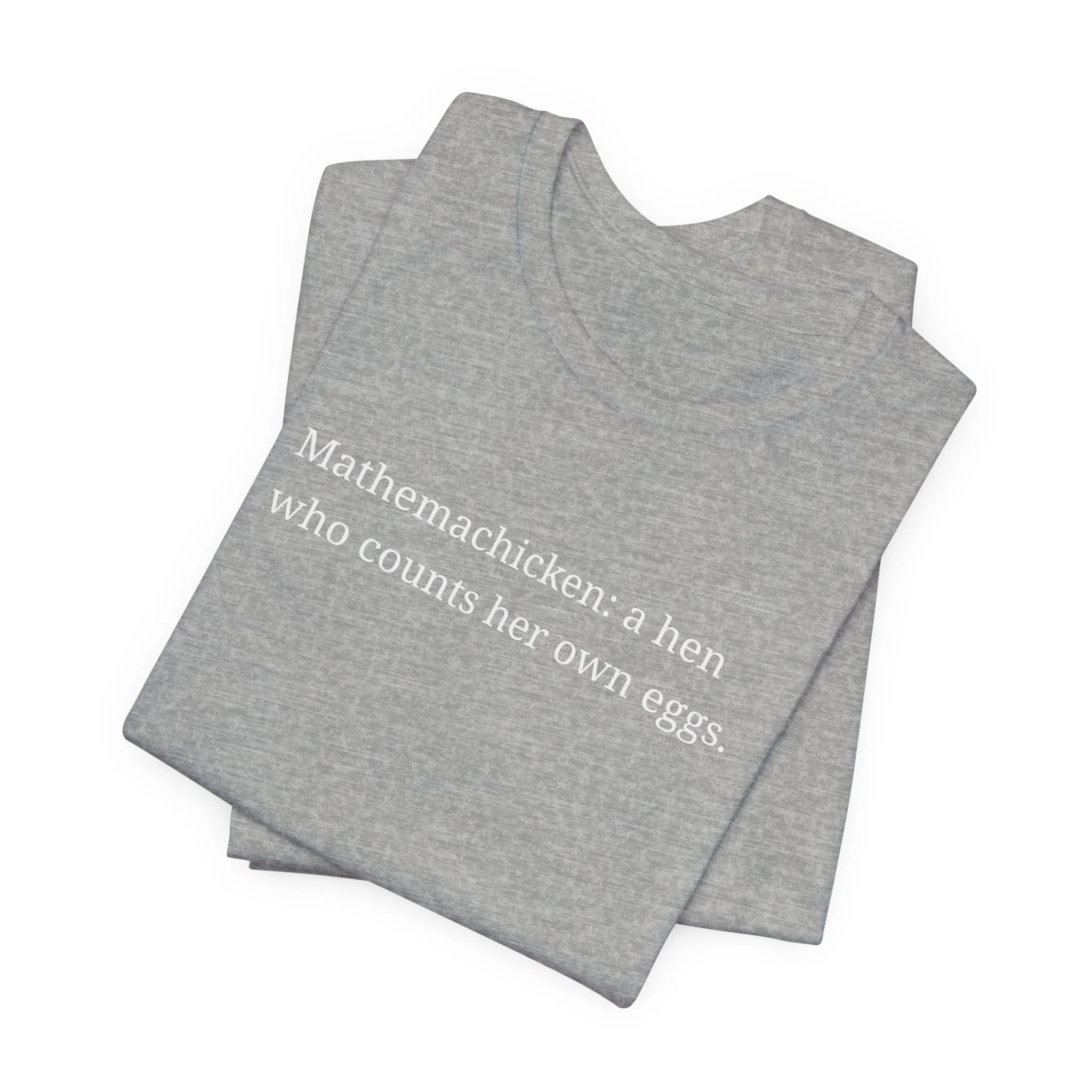 Heather gray t-shirt featuring a minimalist math pun definition reading “Mathemachicken: a hen who counts her own eggs” in soft white text