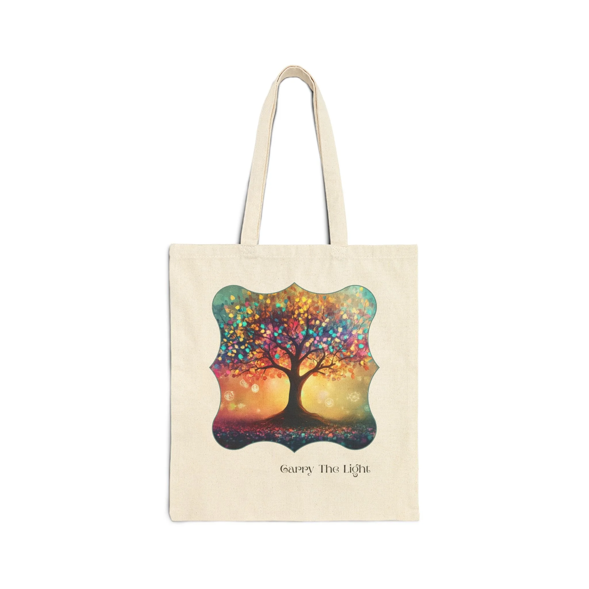 Natural canvas tote bag with scalloped frame artwork of glowing tree titled Carry the Light