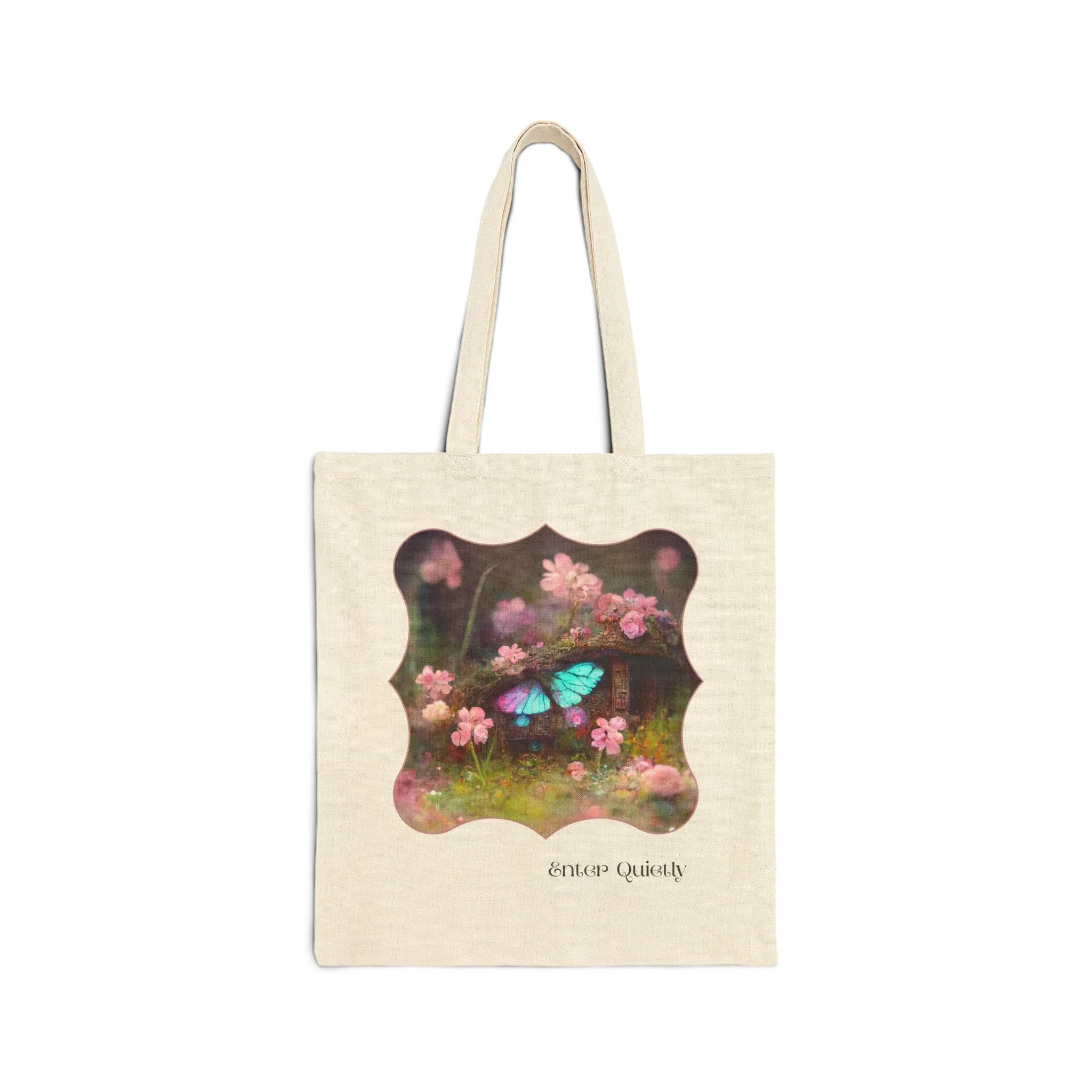 Natural canvas tote bag with scalloped frame artwork of a fairy door and glowing butterfly titled Enter Quietly