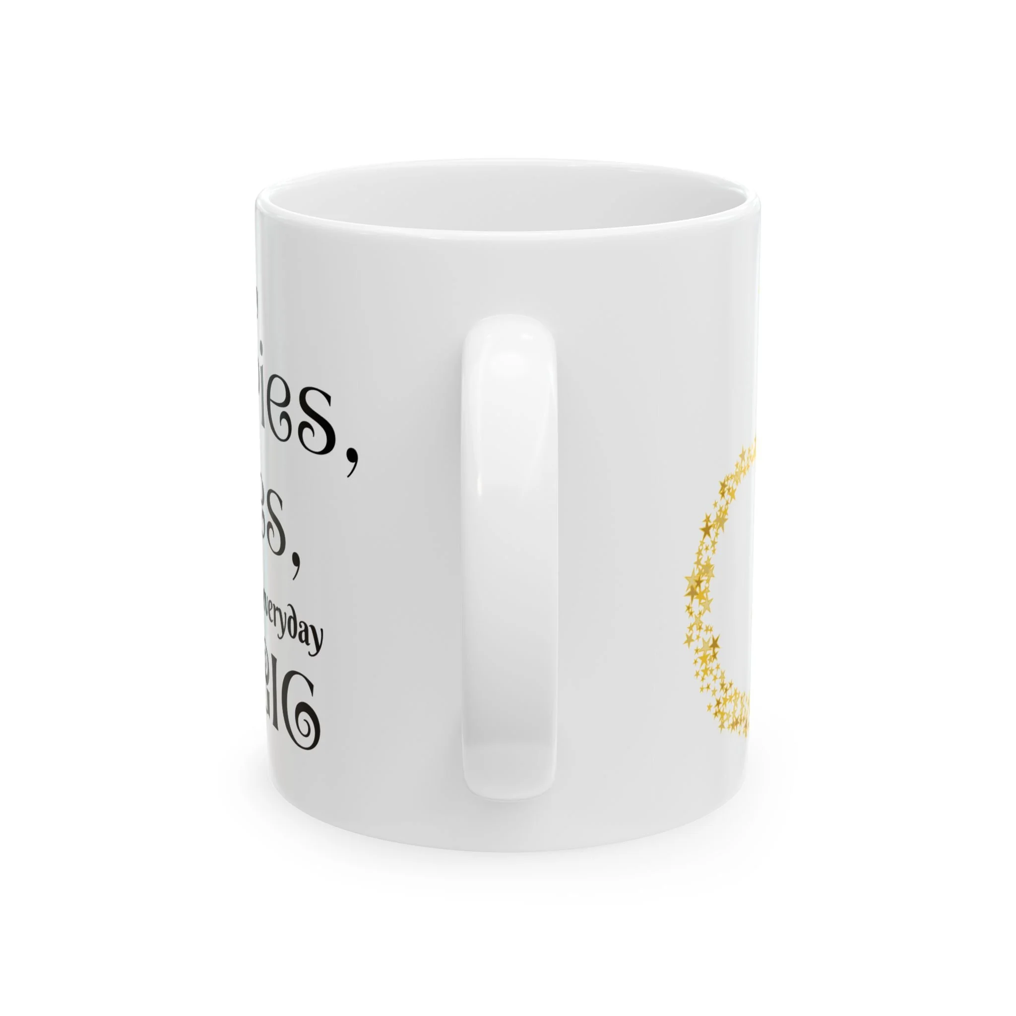 Side view of white ceramic fantasy mug showing handle and partial fairies elves magic quote