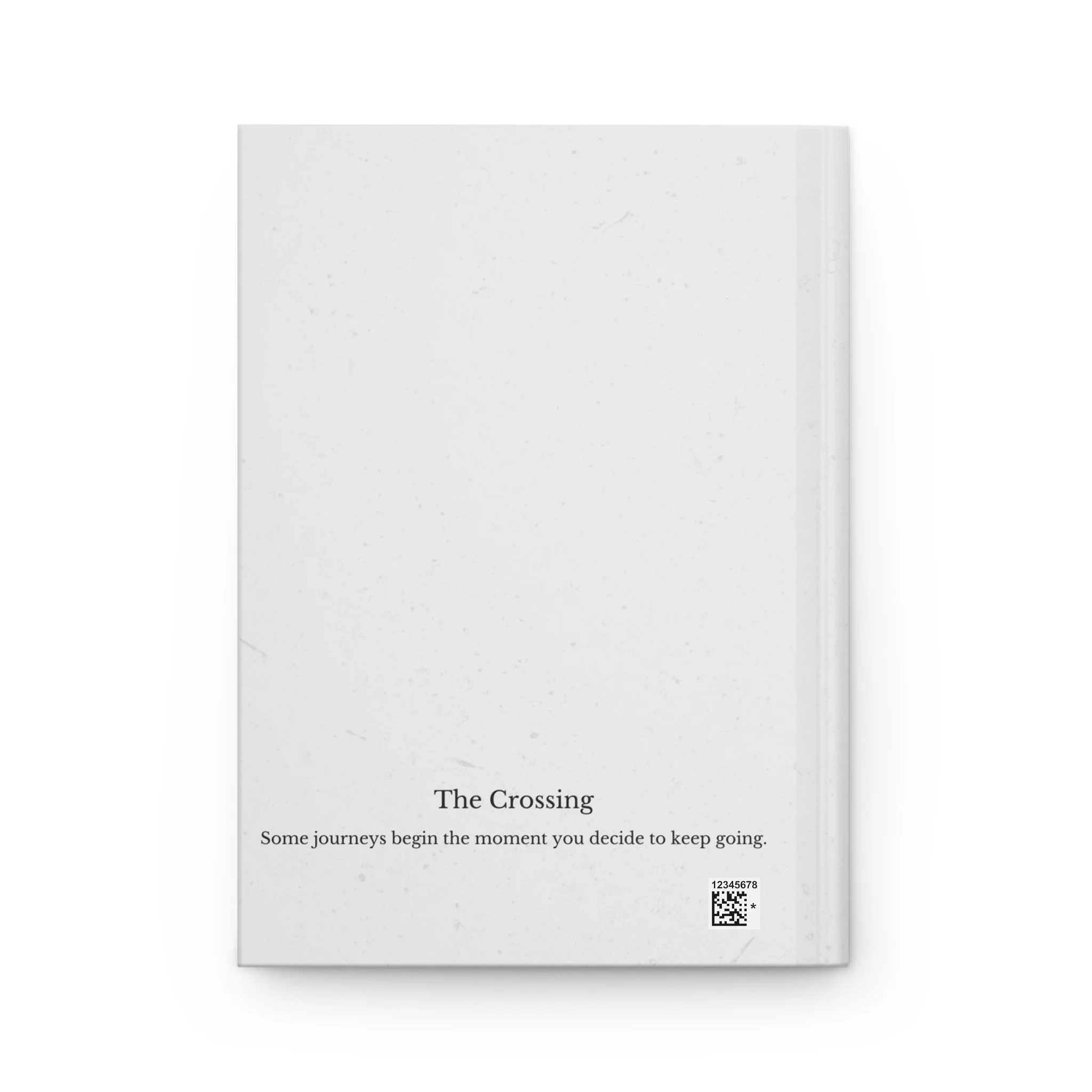Back cover view of “The Crossing” journal with soft white textured background and printed quote near the bottom