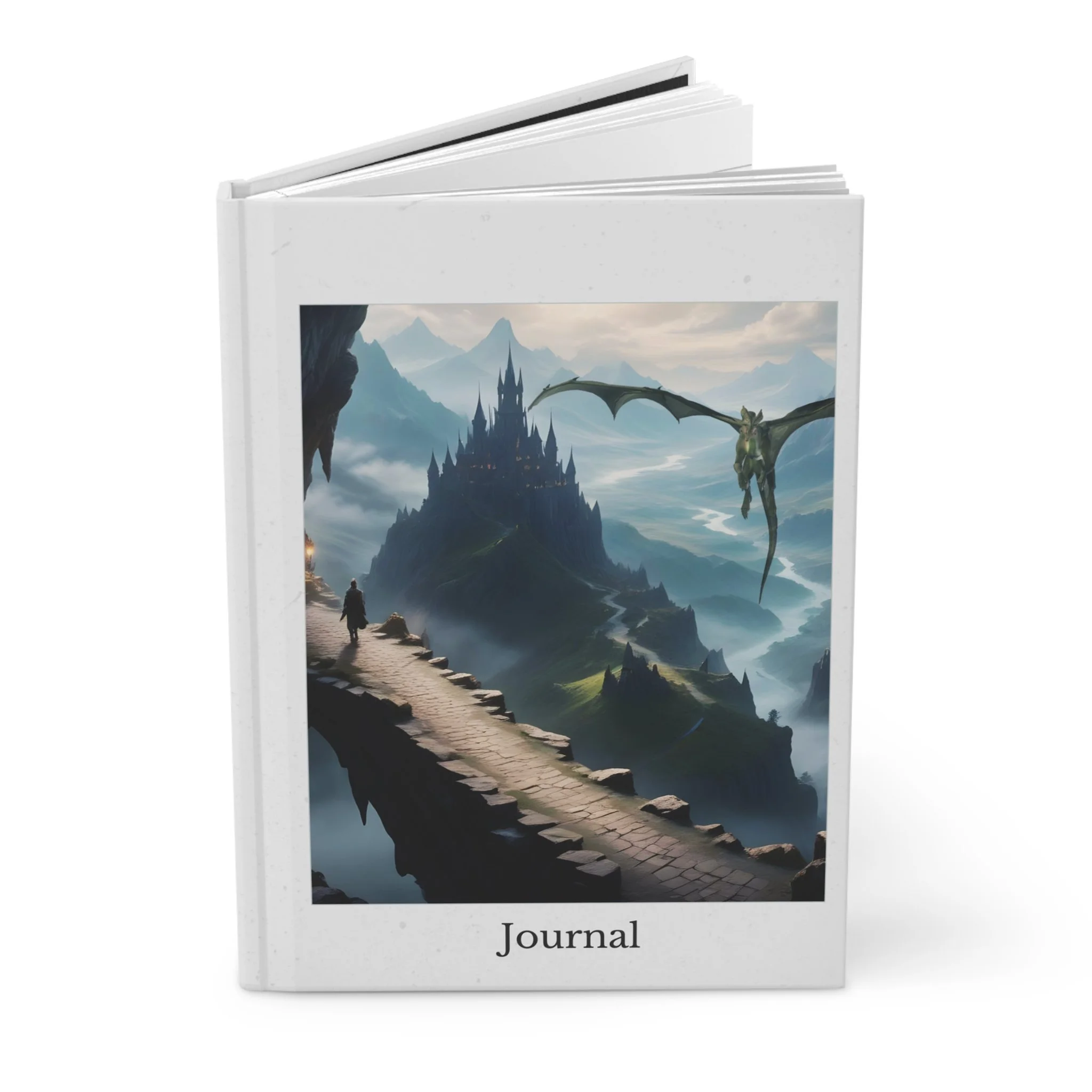 Closed fantasy journal standing upright showing stone bridge, castle, and dragon artwork on the cover
