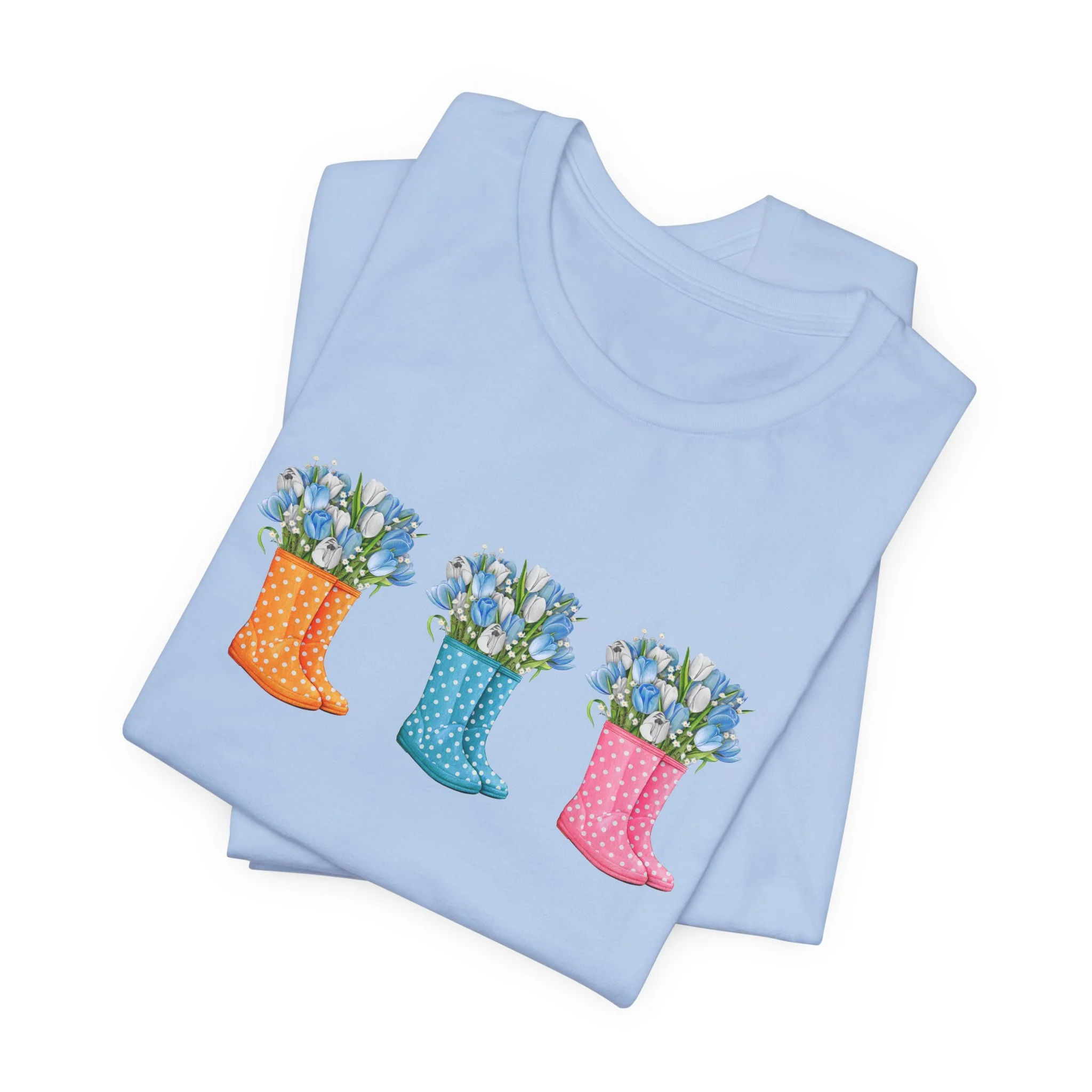Folded baby blue t-shirt featuring Floral Rain Boots graphic