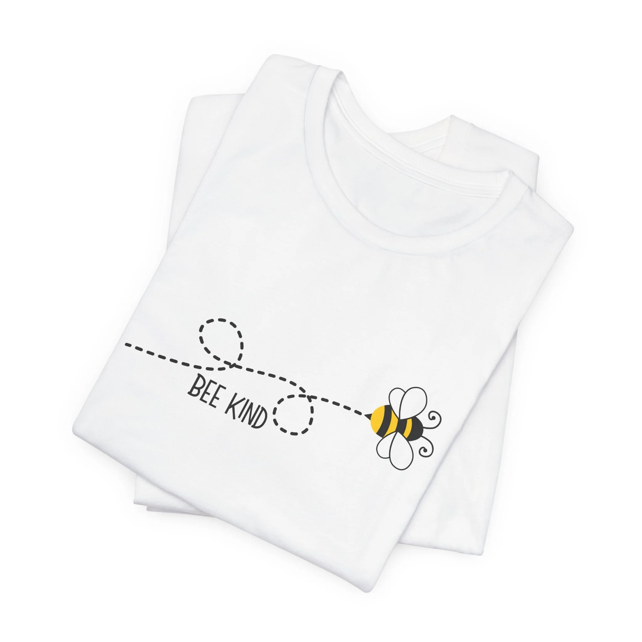 Folded white t-shirt featuring Bee Kind graphic