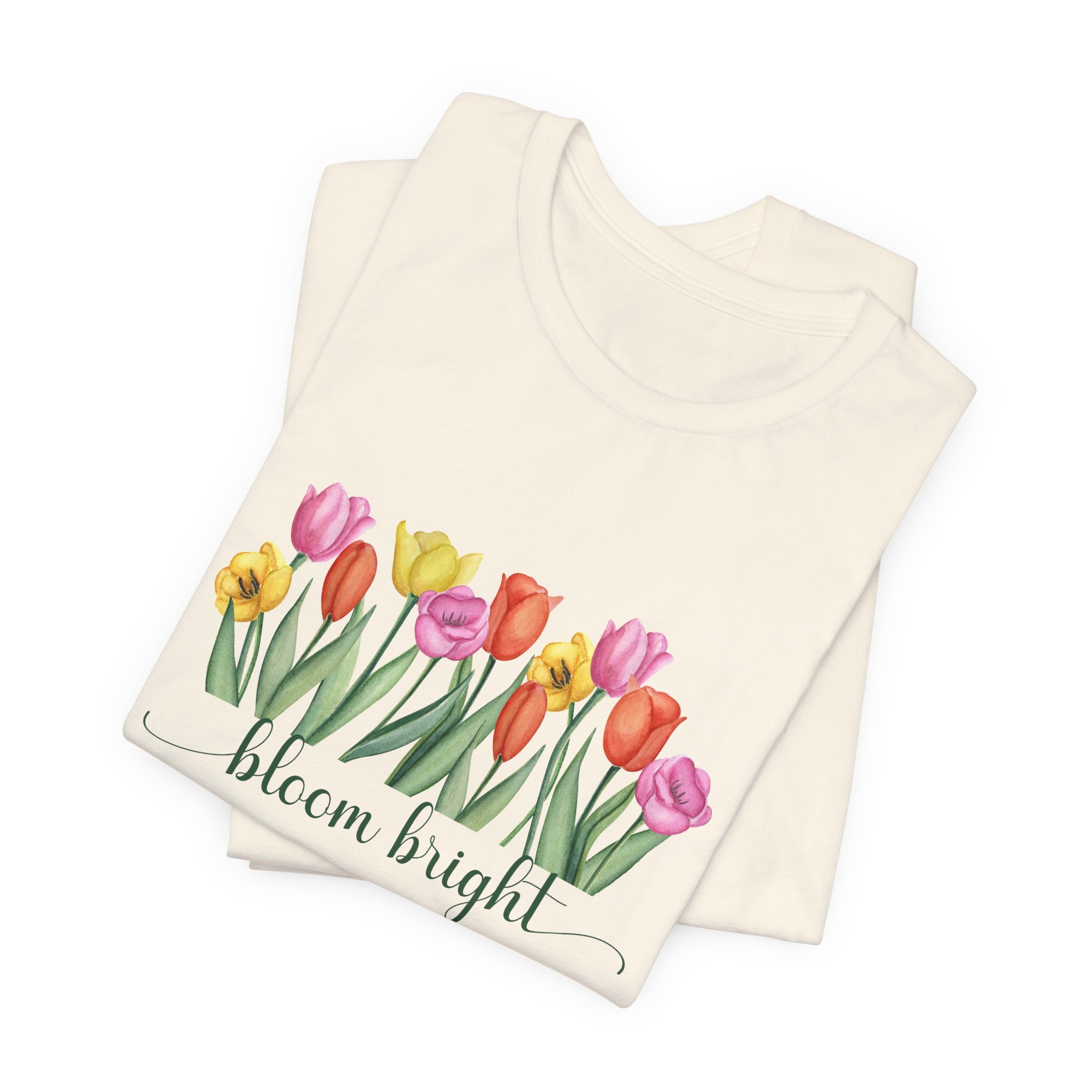 Folded natural cream t-shirt featuring Bloom Bright graphic