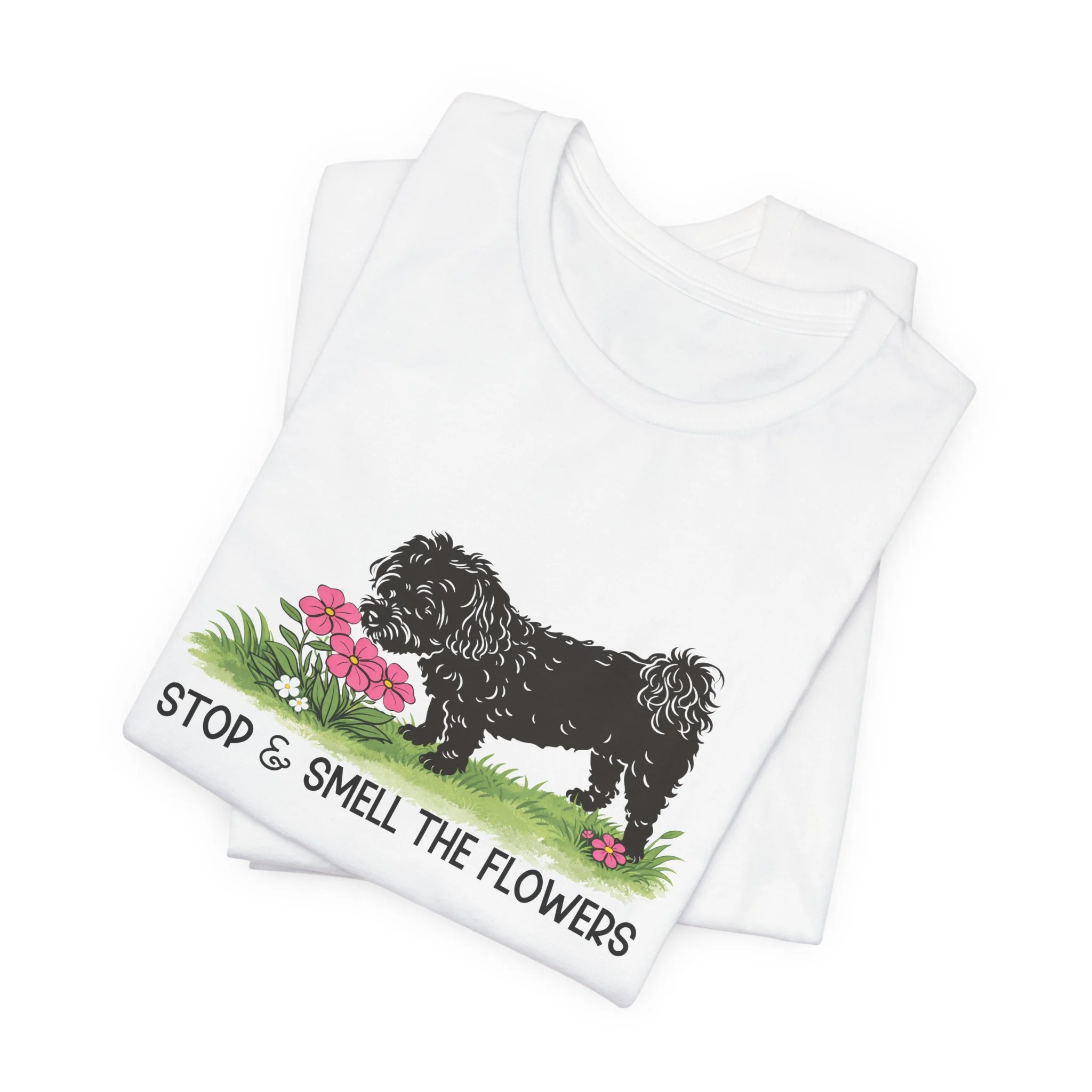Folded white t-shirt featuring Stop and Smell the Flowers graphic