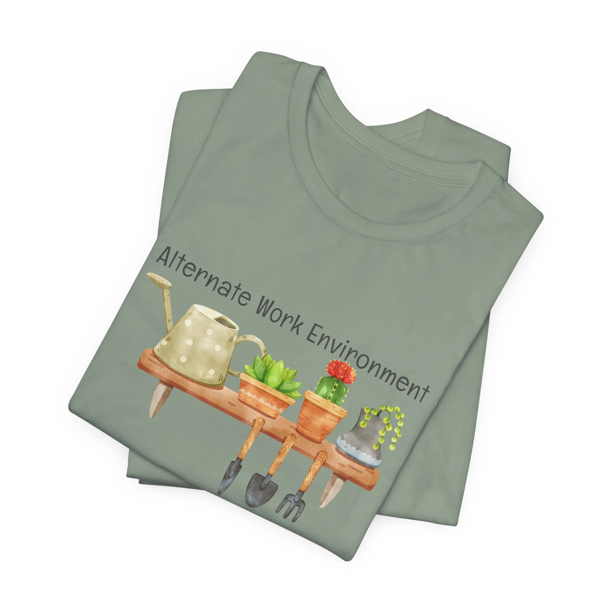 Folded sage green t-shirt featuring Alternate Work Environment graphic