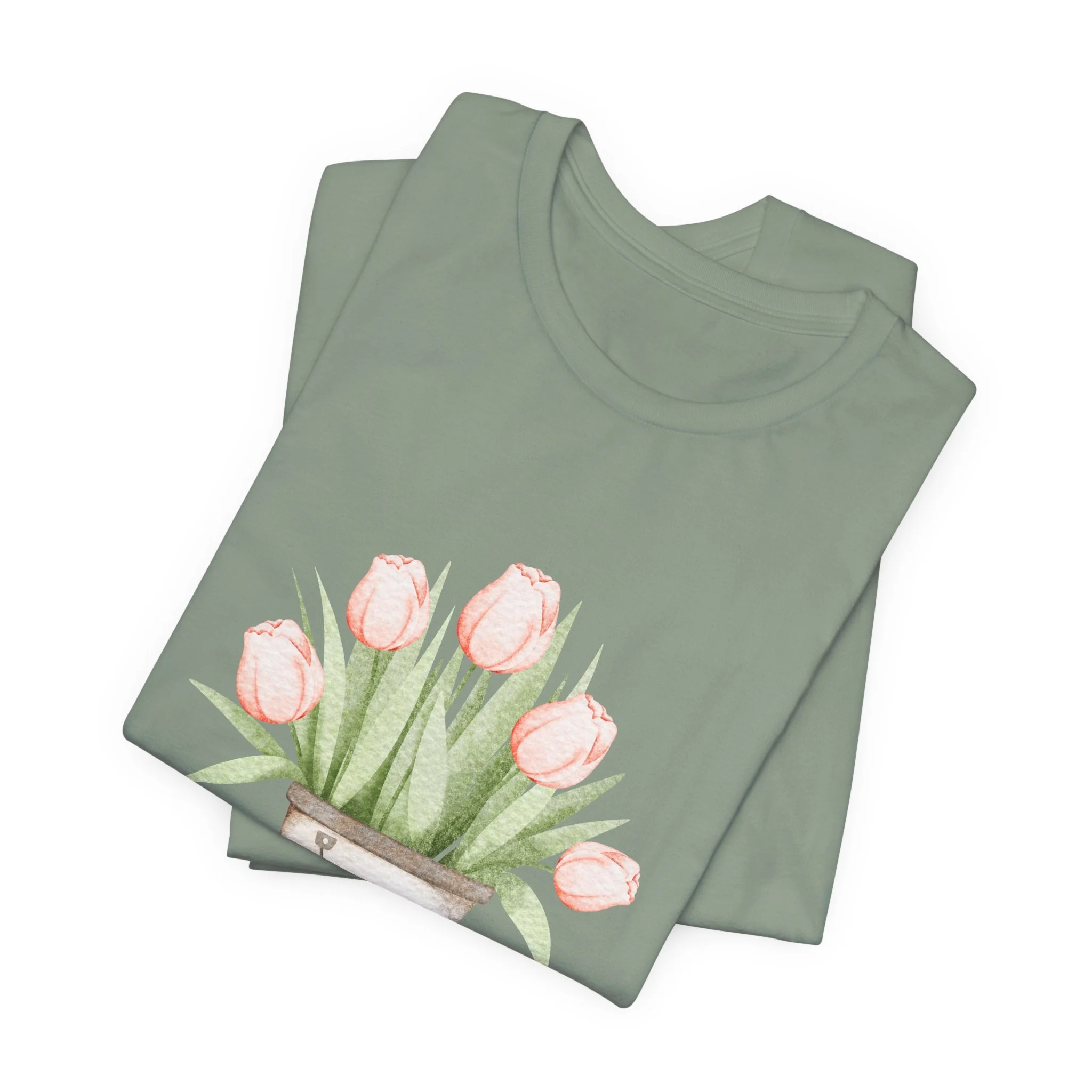 Folded sage green t-shirt featuring Tulip Bucket graphic