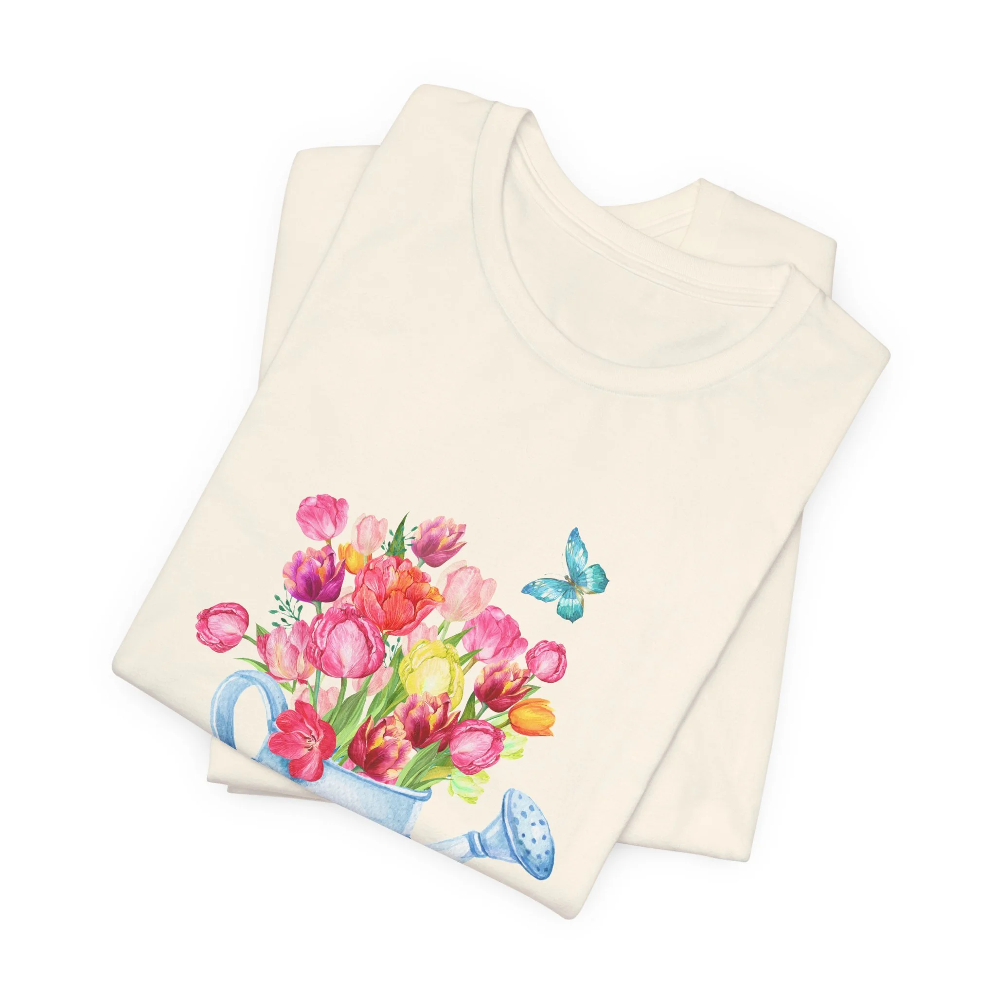 Folded natural cream t-shirt featuring Tulips in Watering Can graphic