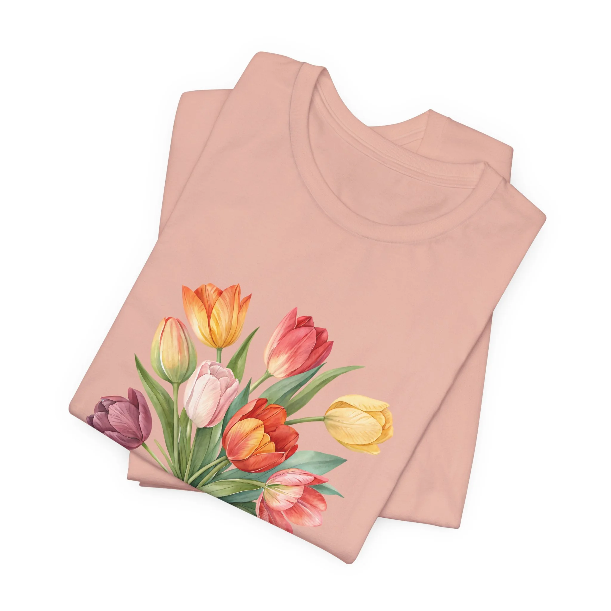 Folded peach t-shirt featuring Tulip Bouquet graphic