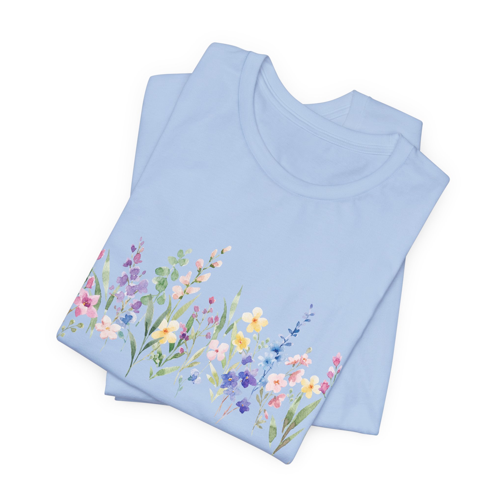 Folded baby blue t-shirt with colorful watercolor wildflower border design