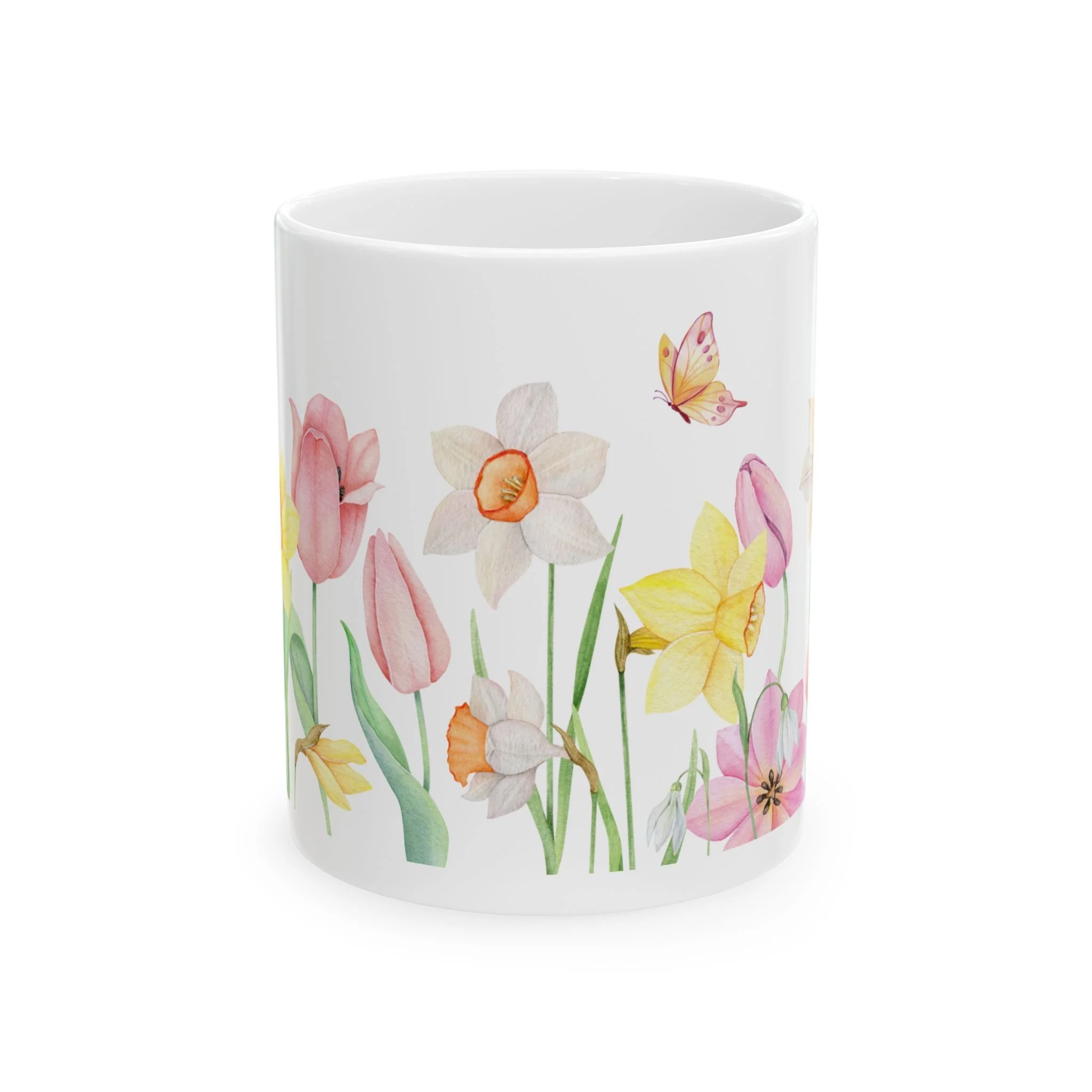Side view of mug showing mixed spring flowers and soft greenery