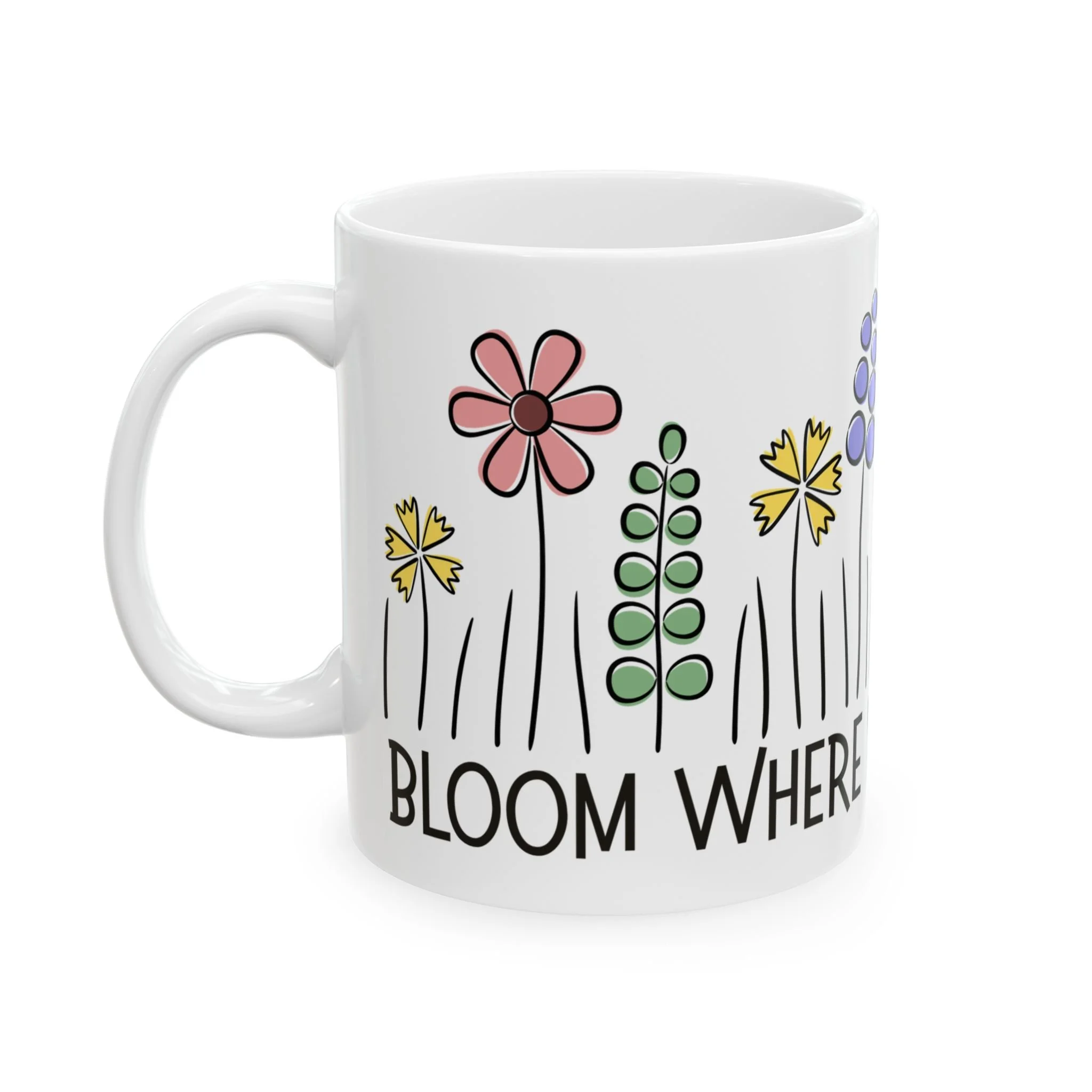 Front view of white ceramic mug with bloom where you are planted text and simple floral illustrations