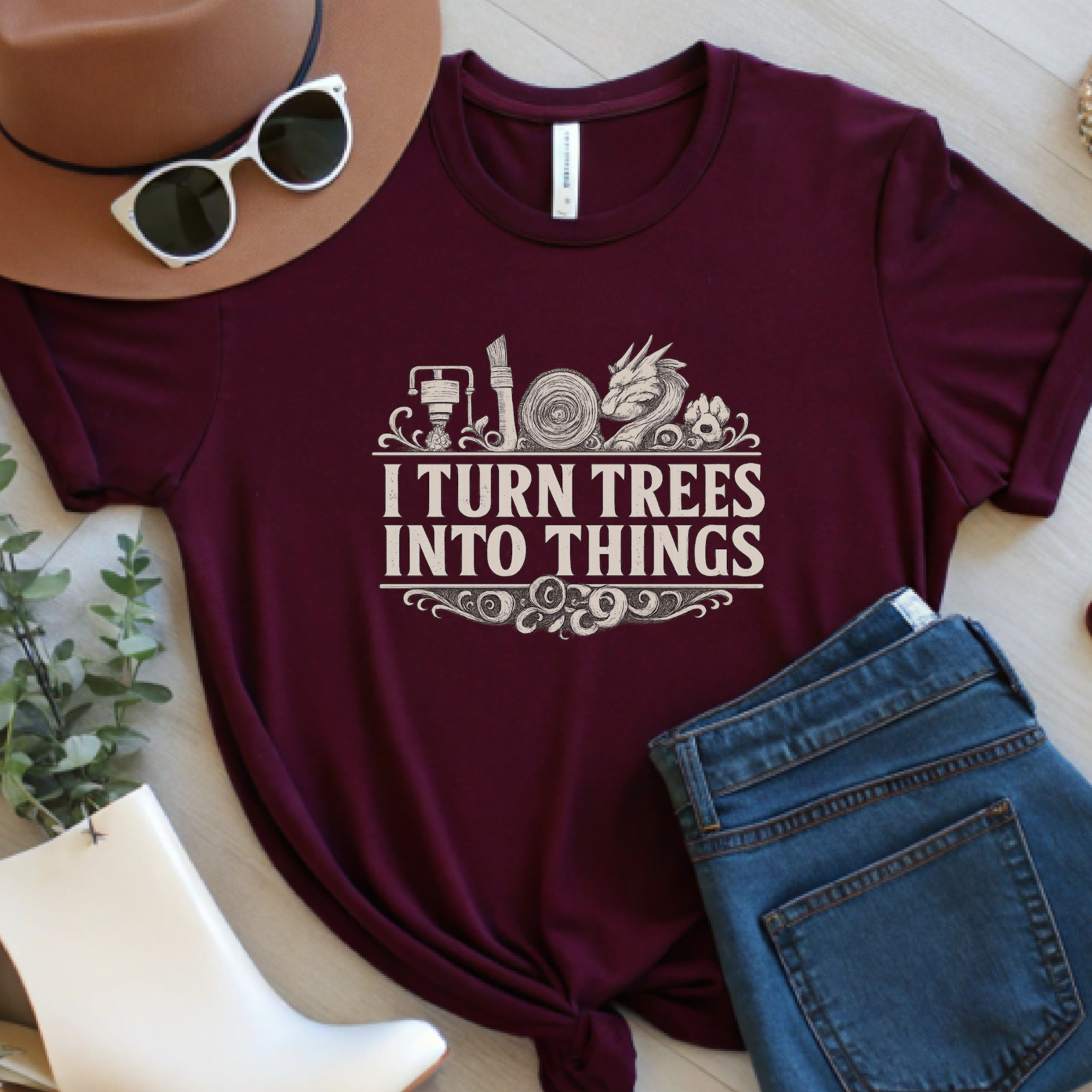 Maroon maker graphic t-shirt featuring laser engraving inspired woodcraft design