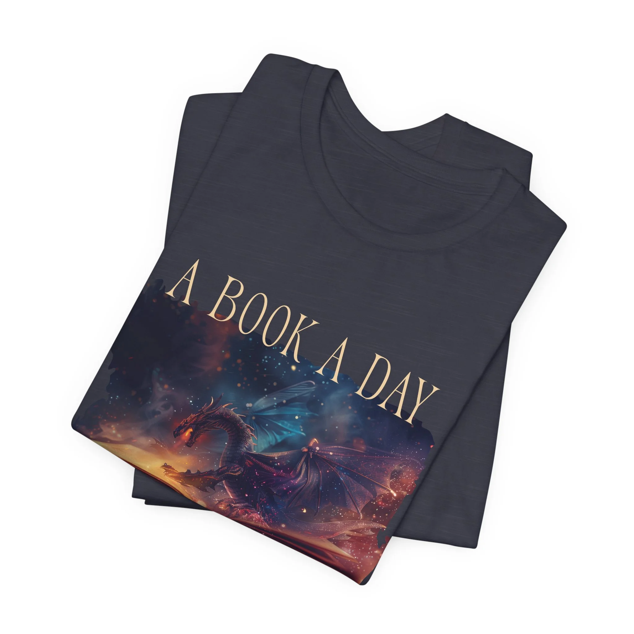 Heathered midnight navy fantasy reading shirt with magical dragon illustration and metallic-style lettering.