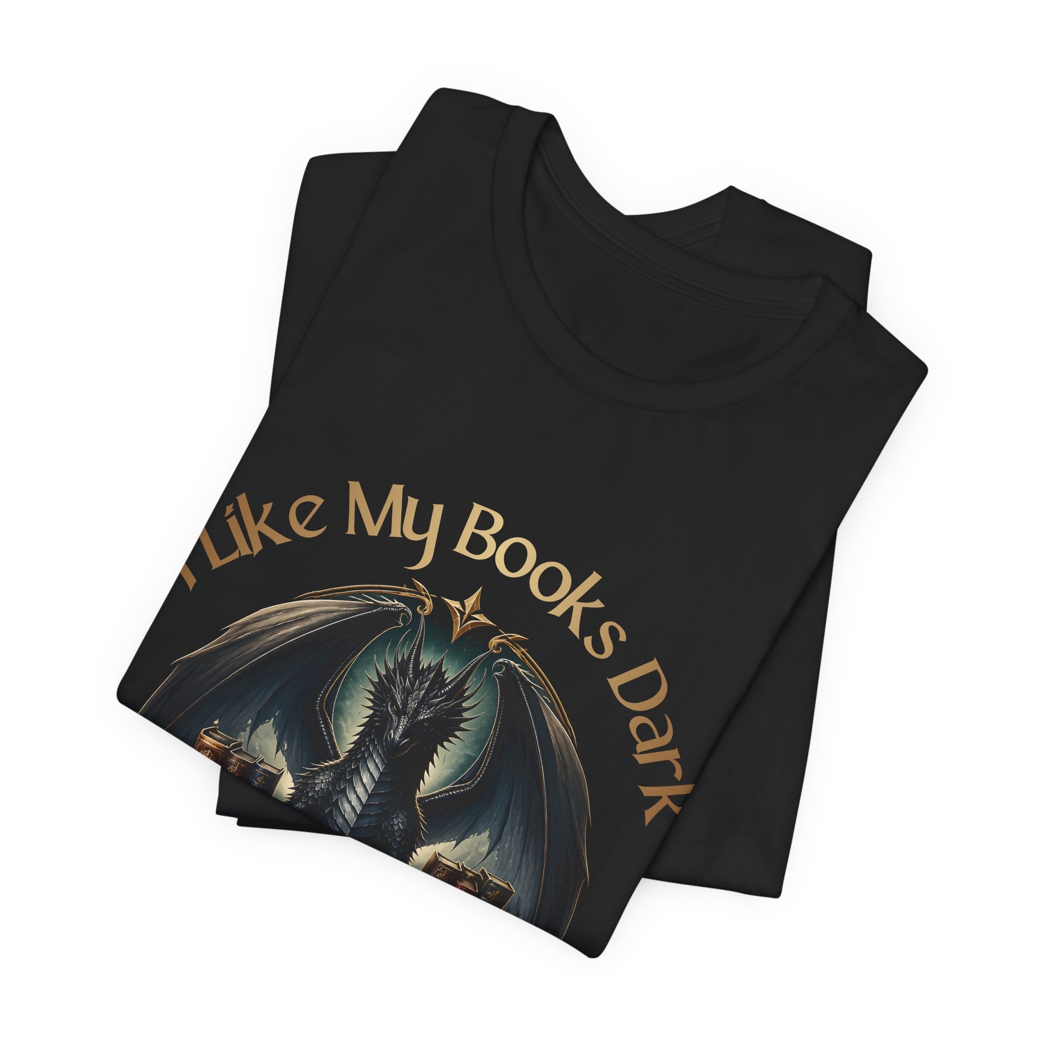 Folded black dragon book lover shirt with bronze lettering and detailed fantasy artwork.
