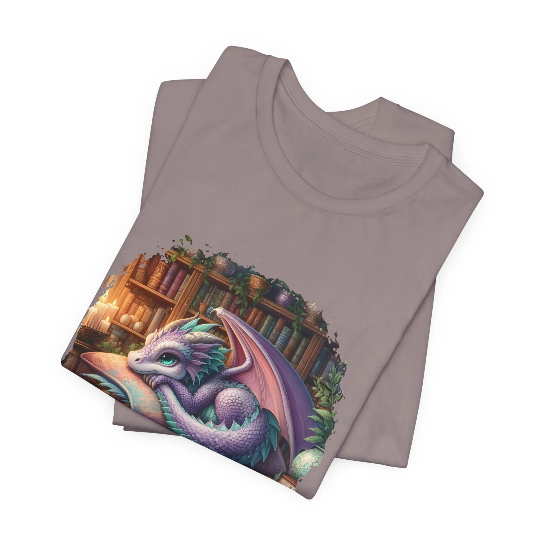 Pebble brown dragon reader shirt featuring a sleeping dragon surrounded by books and glowing shelves.