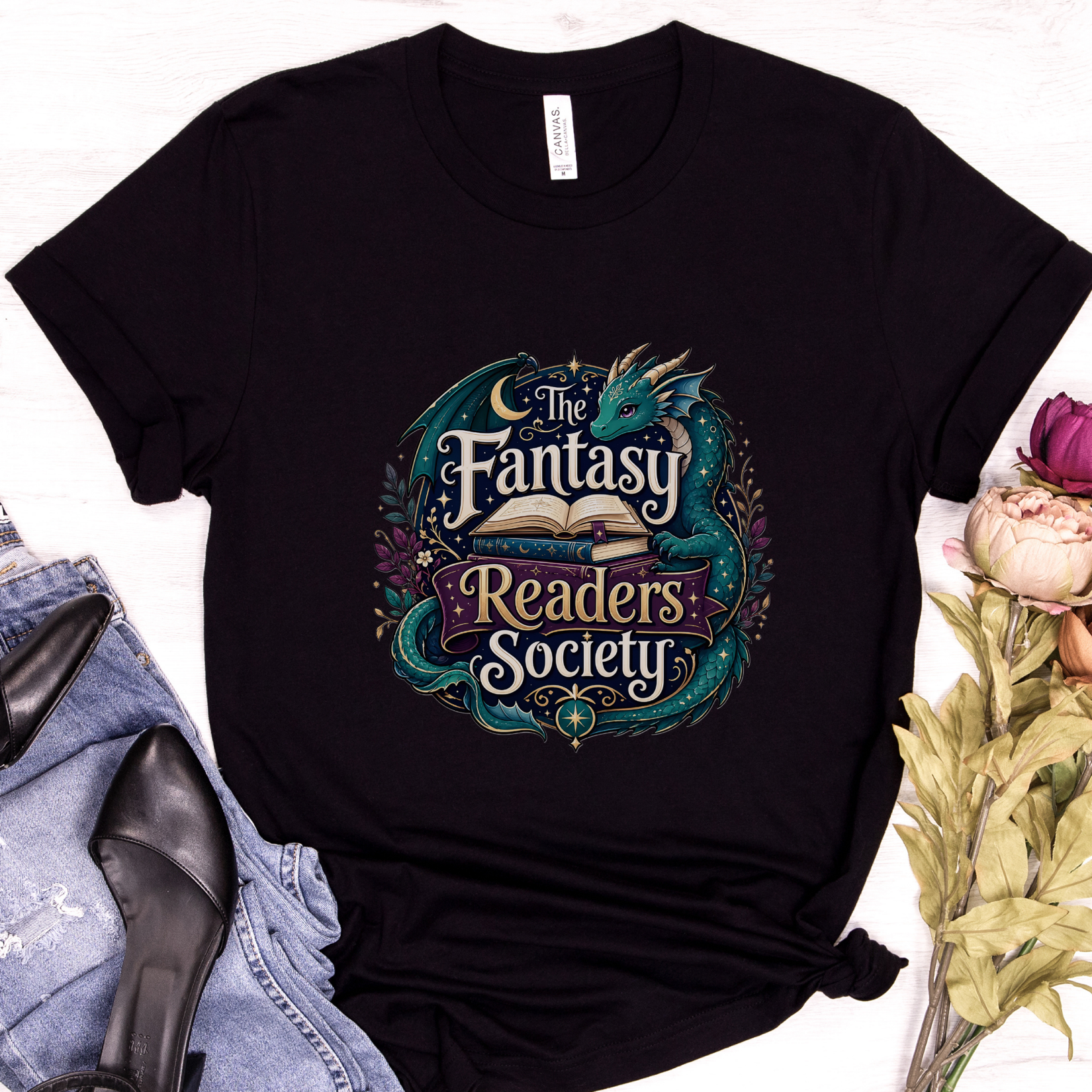 Black Fantasy Readers Society t-shirt featuring whimsical dragon artwork and stacked books with ornate lettering.