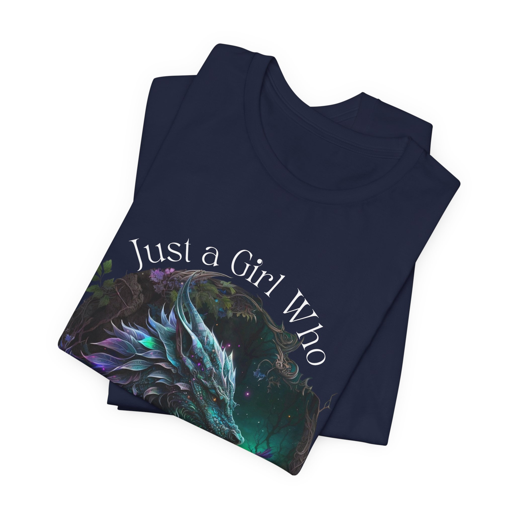 Folded team navy graphic tee with colorful dragon artwork and fantasy-inspired lettering.