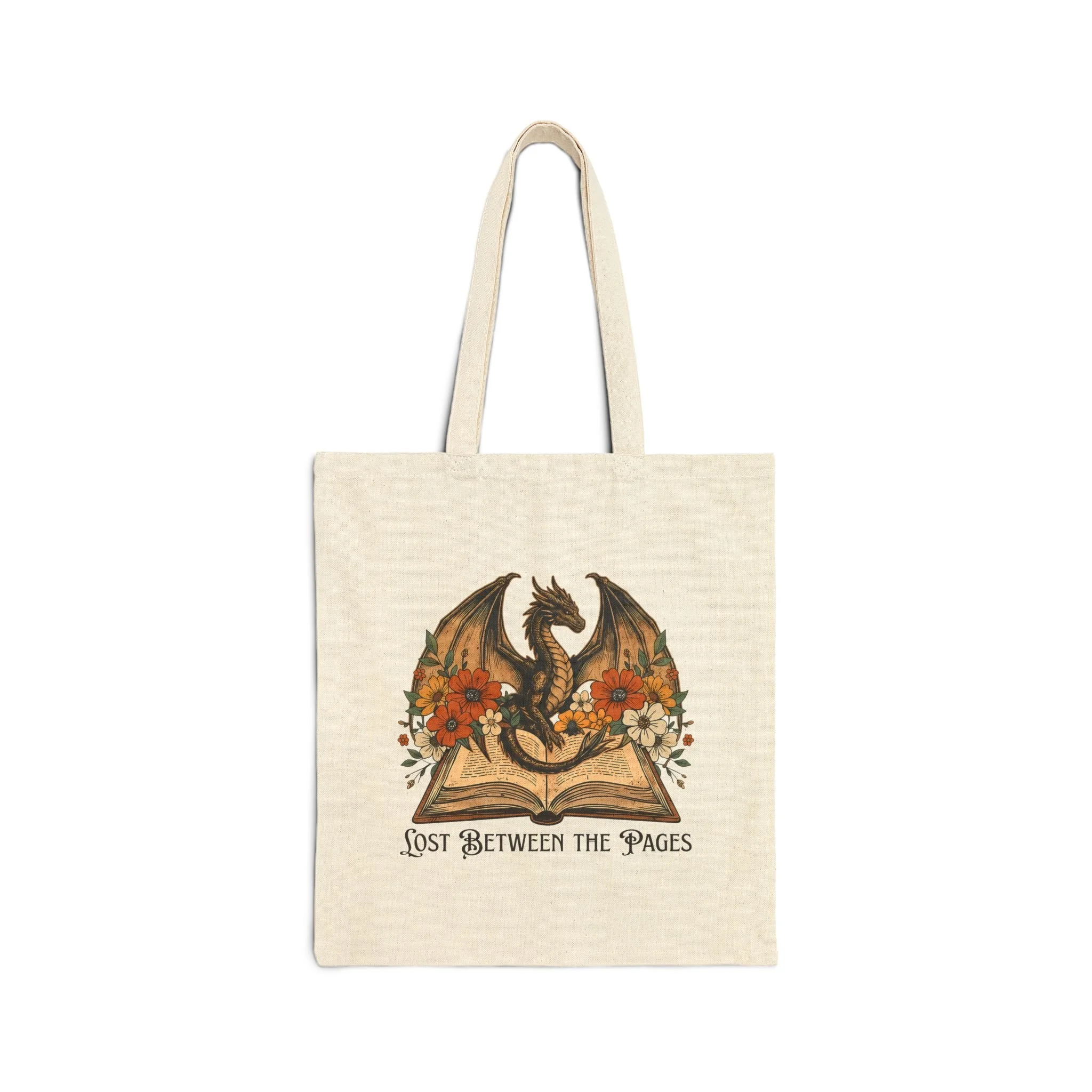 Front view of Lost Between the Pages dragon and open book canvas tote bag.