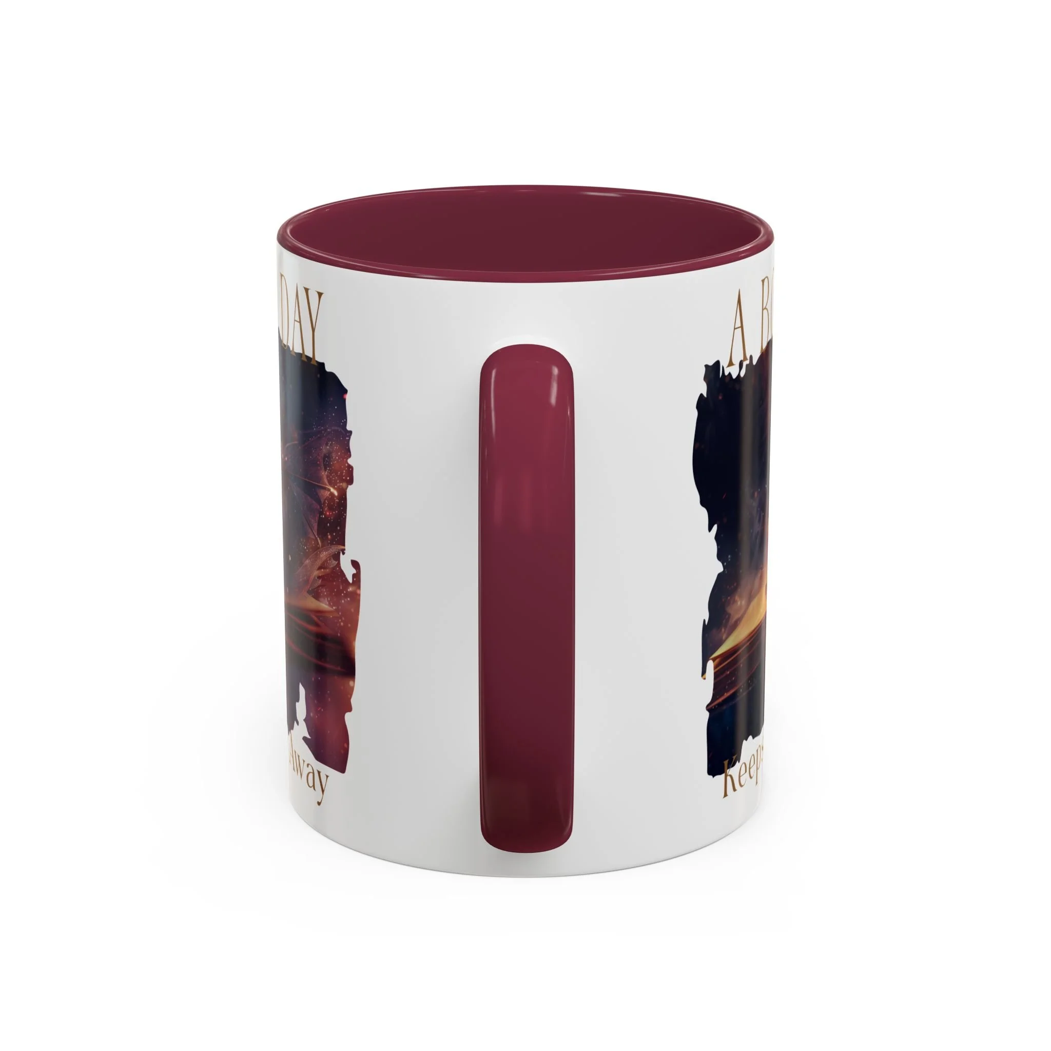 Close-up of burgundy handle on fantasy reader ceramic mug.
