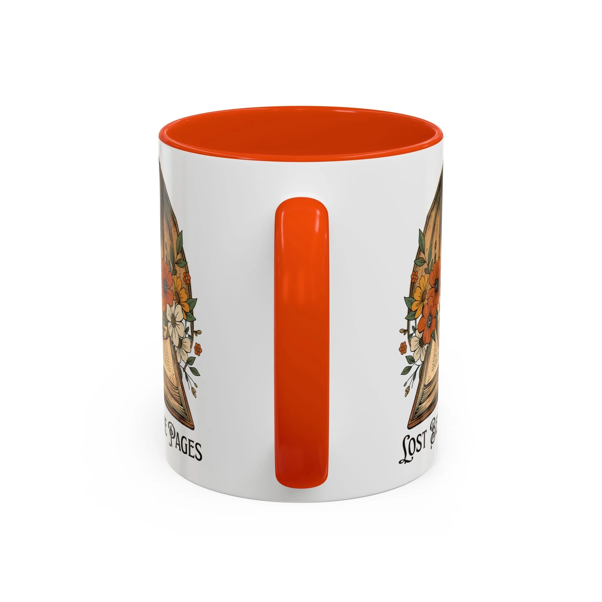 Close-up of orange C-shaped handle on Lost Between the Pages fantasy mug.