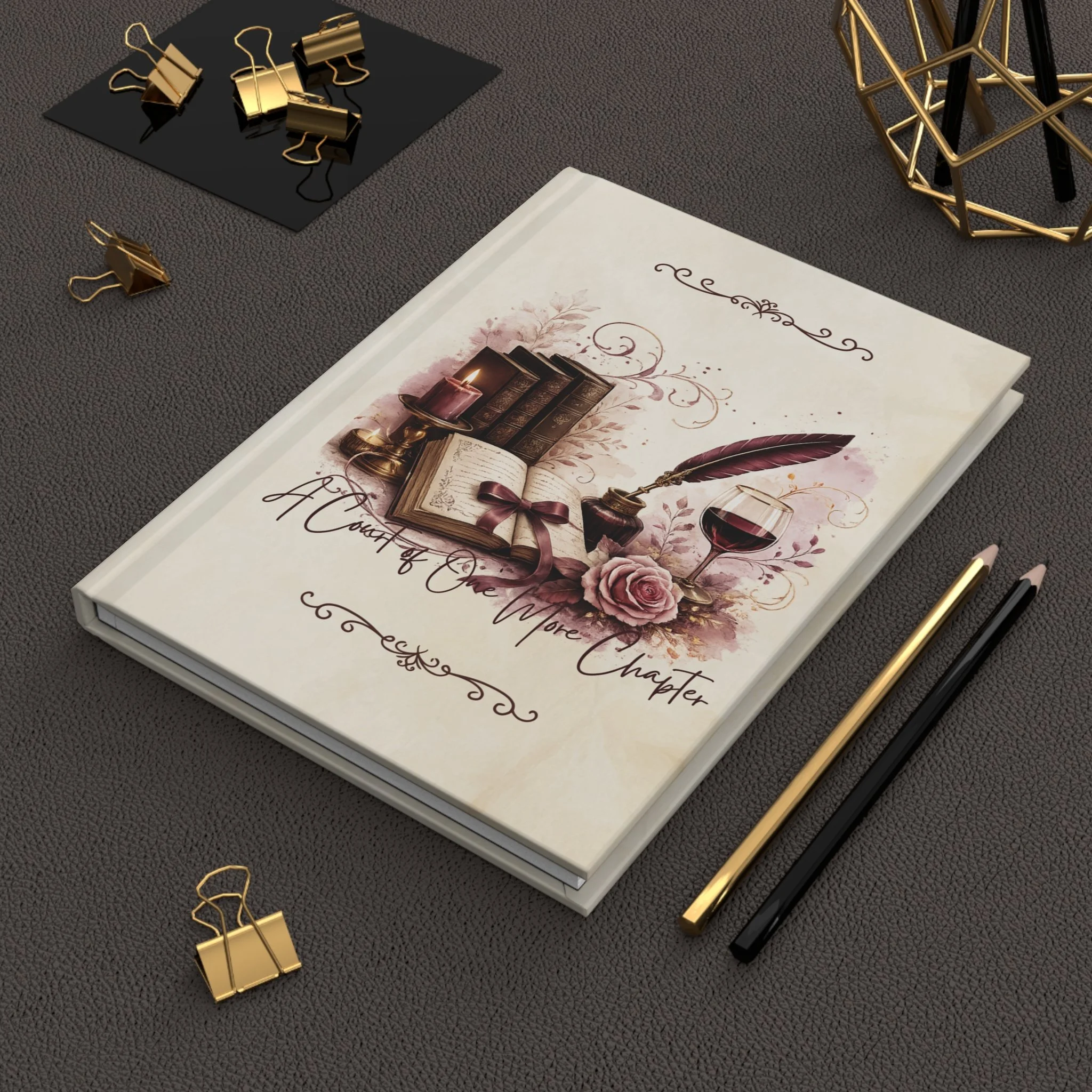 Dark academia hardcover notebook displayed beside candles with vintage-inspired book artwork.