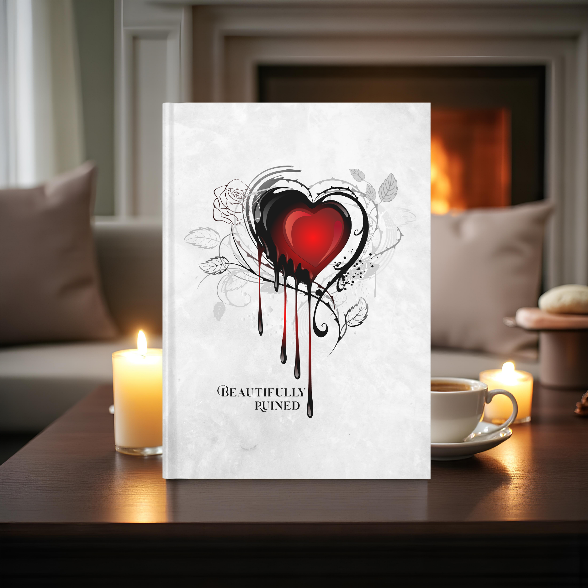 Beautifully Ruined hardcover journal displayed on a table beside candles