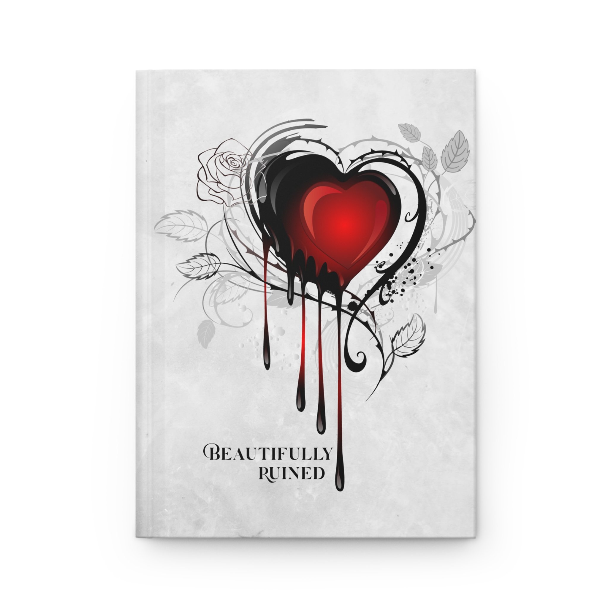 Front cover of Beautifully Ruined hardcover journal featuring glowing red heart artwork