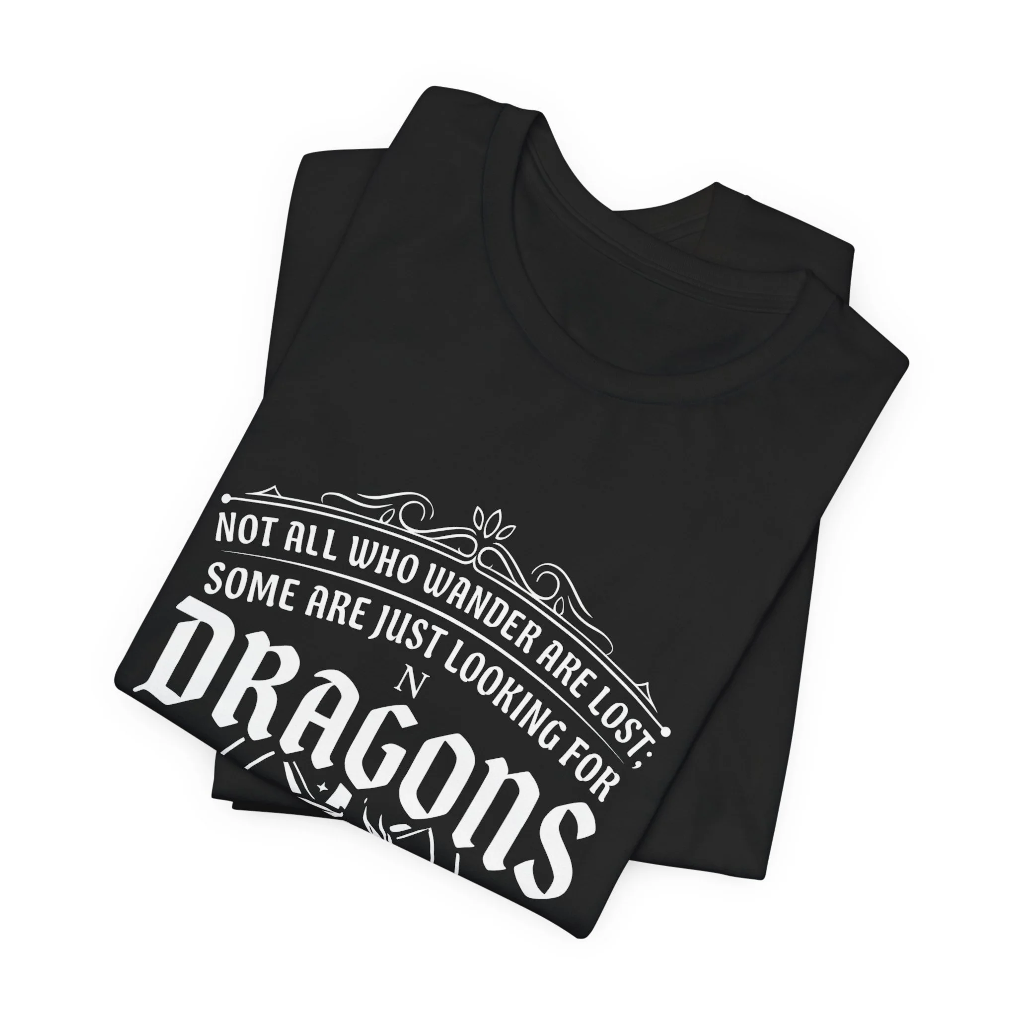 Folded Black Bella+Canvas fantasy dragon graphic t-shirt.