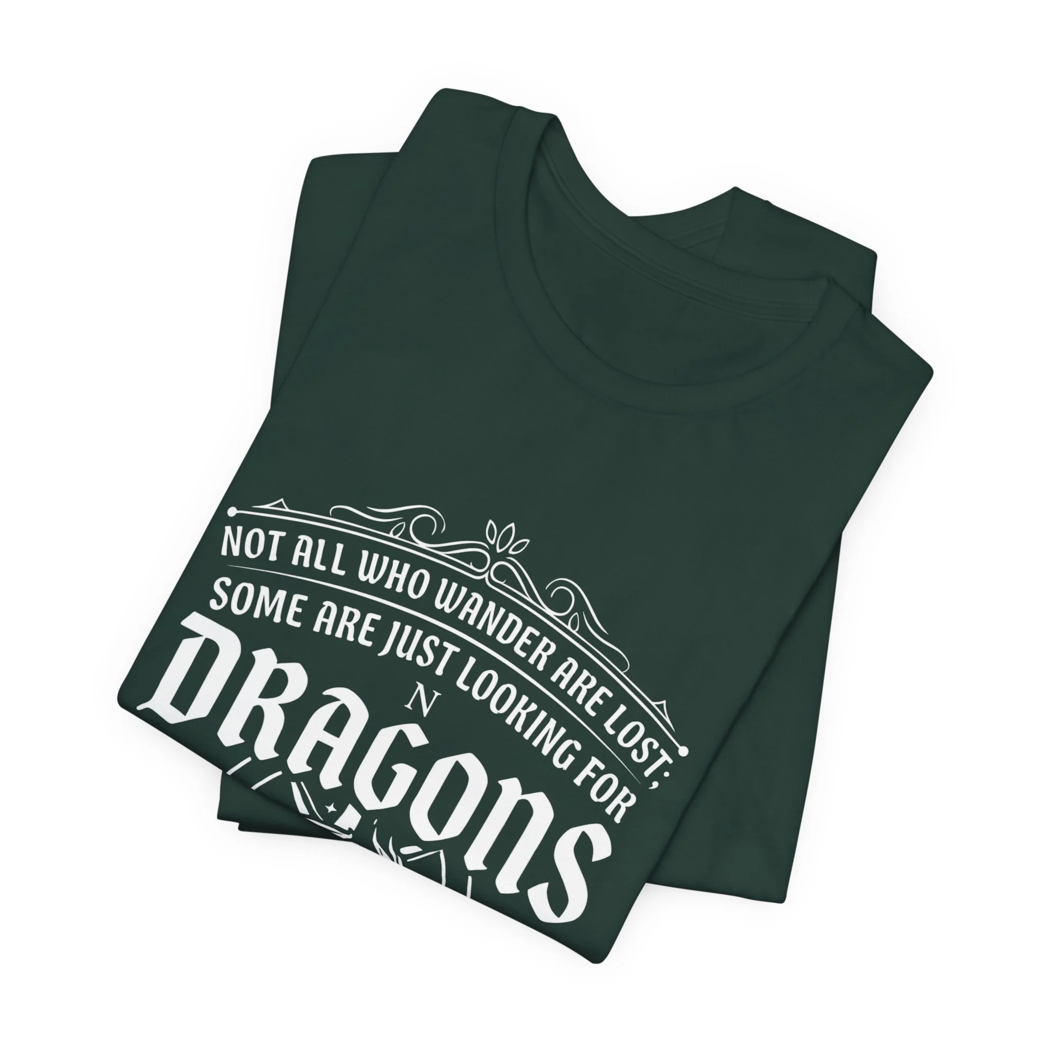 Folded Forest Green Bella+Canvas fantasy dragon graphic t-shirt.
