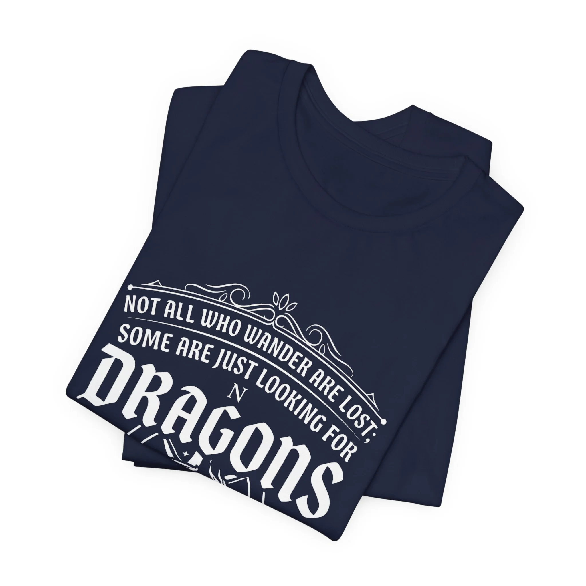 Folded Navy Bella+Canvas fantasy dragon graphic t-shirt.