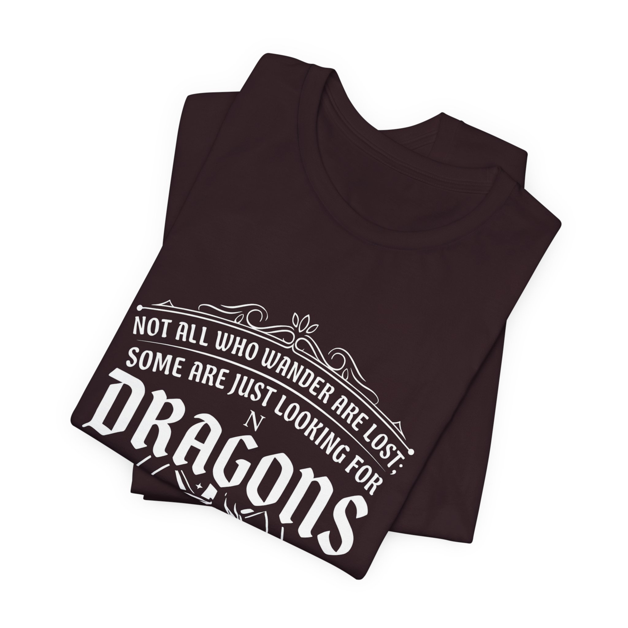 Folded Oxblood Black Bella+Canvas fantasy dragon graphic t-shirt.
